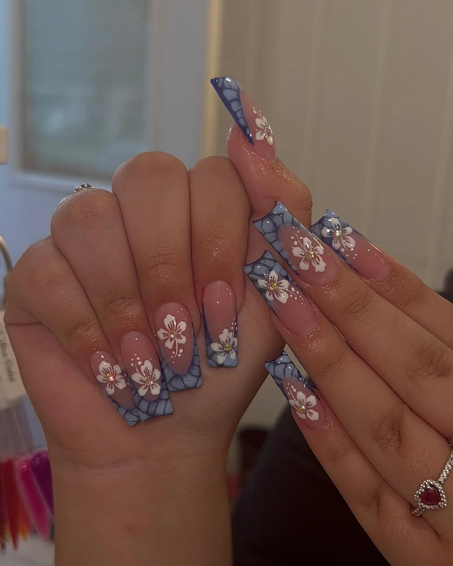 summer acrylic nails 2026 Blue Floral Acrylics With Delicate Porcelain Details