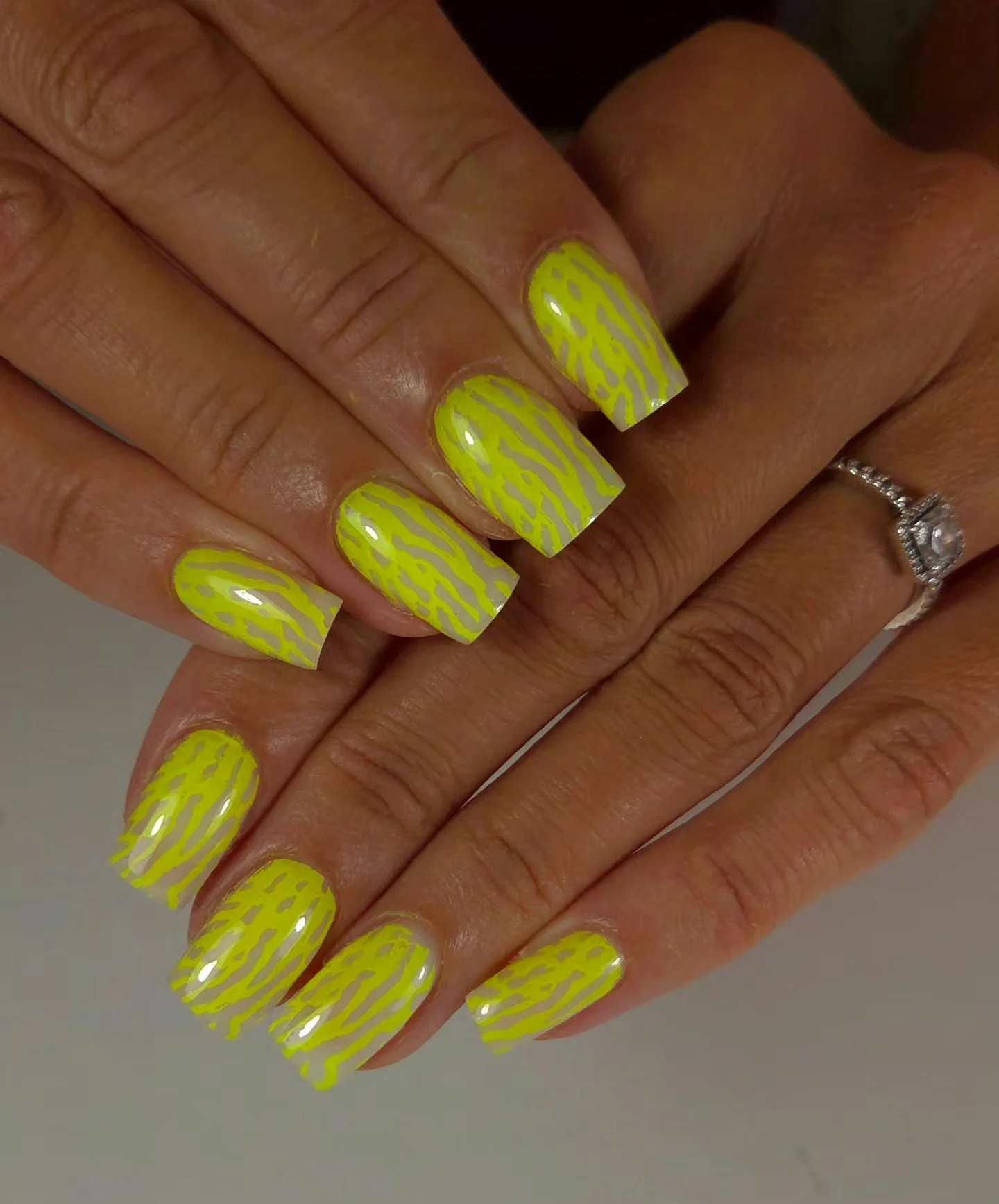 neon summer nails 2026 Soft Neon Yellow Zebra Nails With Minimalist Energy