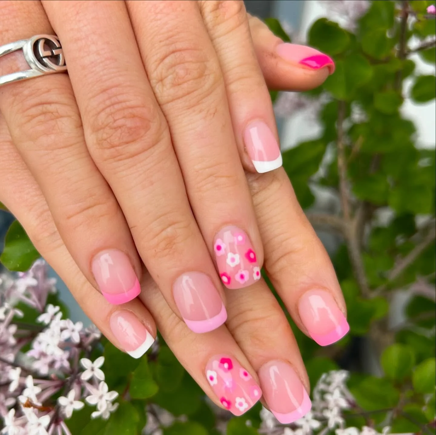 pink summer nails 2026 Short Pink French Tips With Tiny Floral Art
