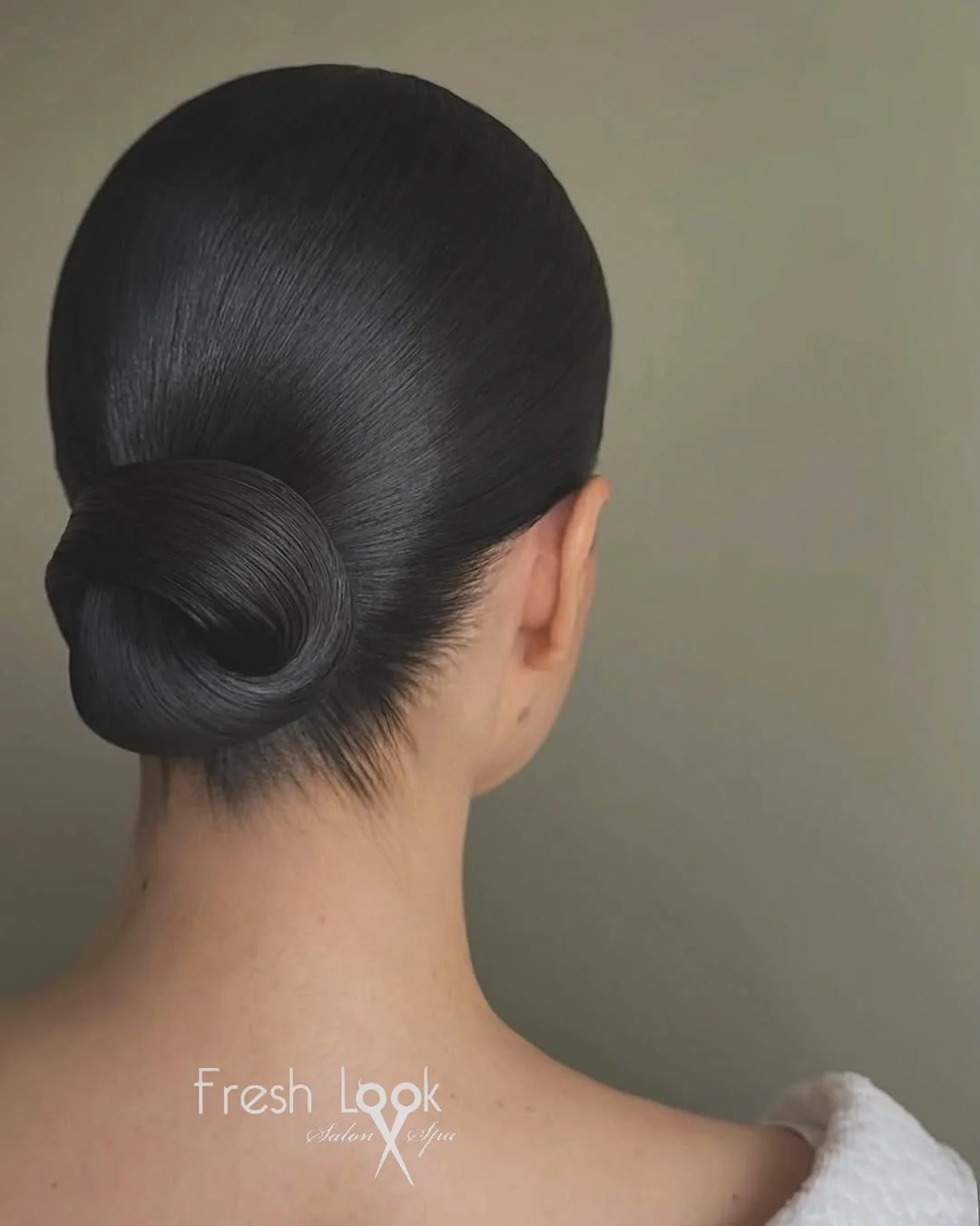 summer hairstyles ideas 2026 Ultra Sleek Low Bun For Hot Summer Days