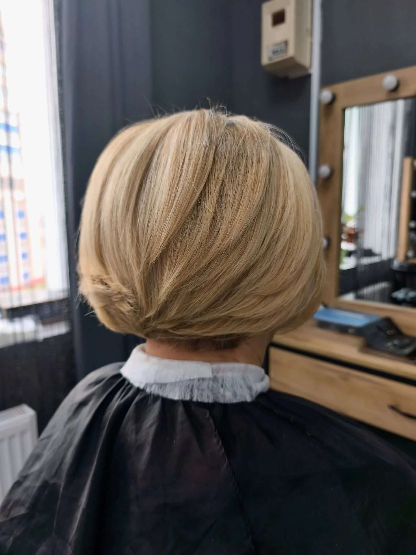 summer haircuts women over 50 Classic Rounded Bob With Smooth Finish