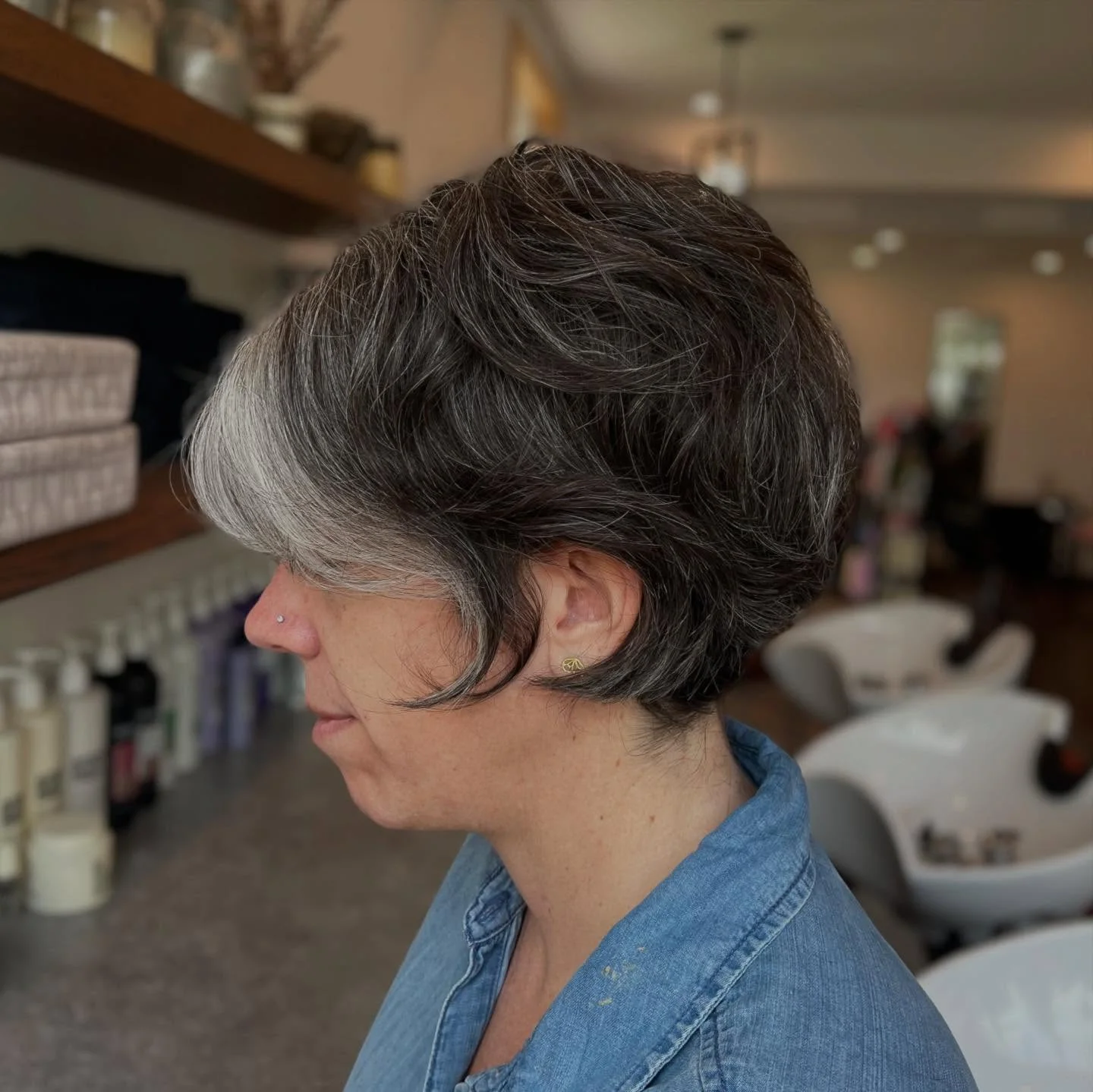 stylish summer haircuts for women over 60 2026 Modern Two-Tone Pixie Bob With Side Sweep