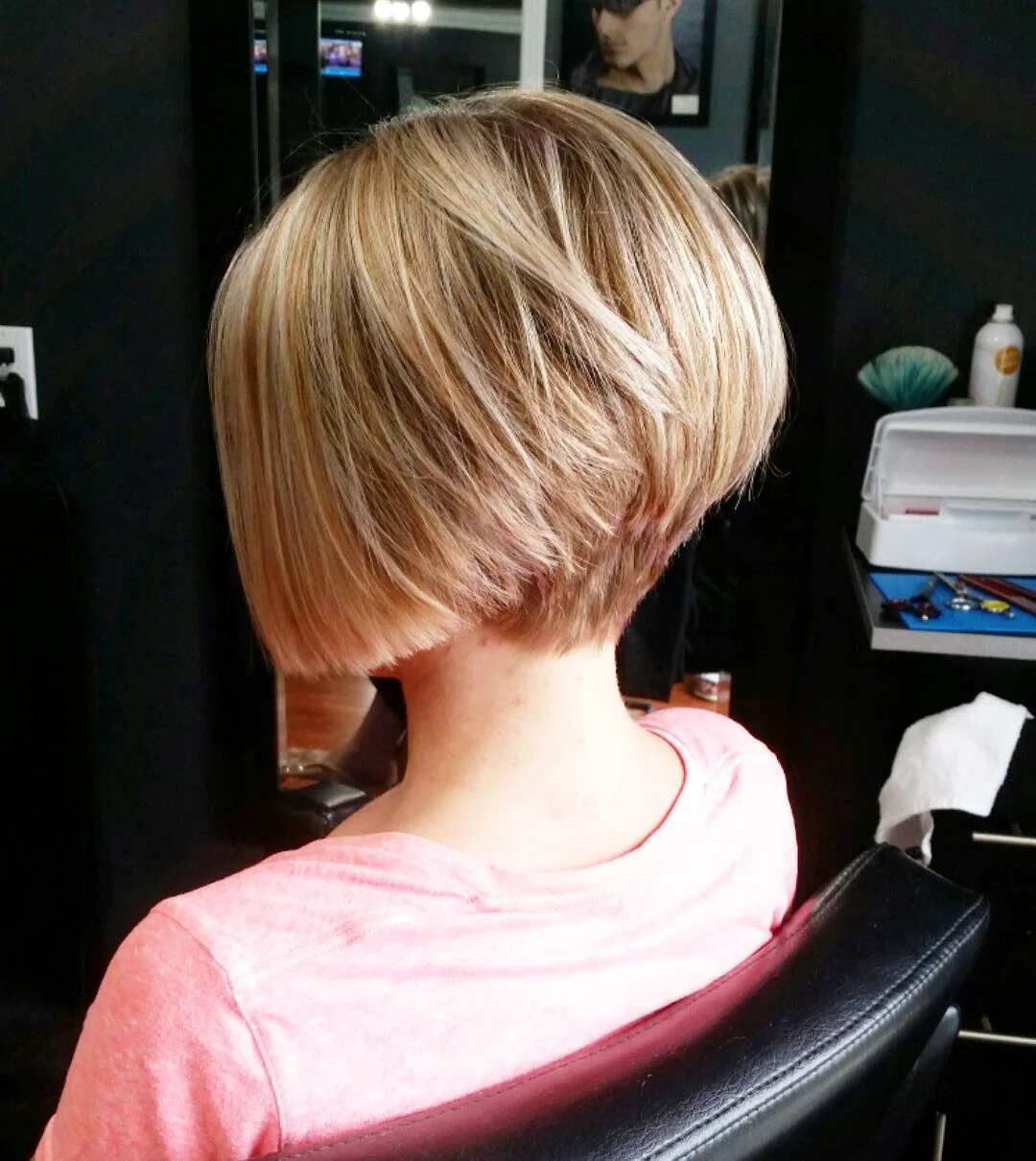 angled summer bob haircut 2026 Soft Tapered Blonde Angle With Airy Layers