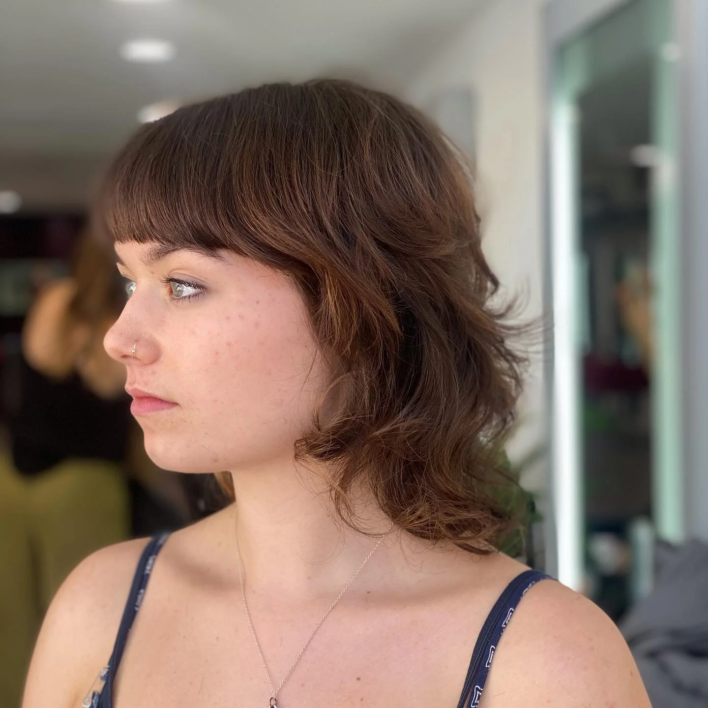 cool summer shag haircut 2026 Soft Brunette Shag With Airy Texture And Micro Bangs