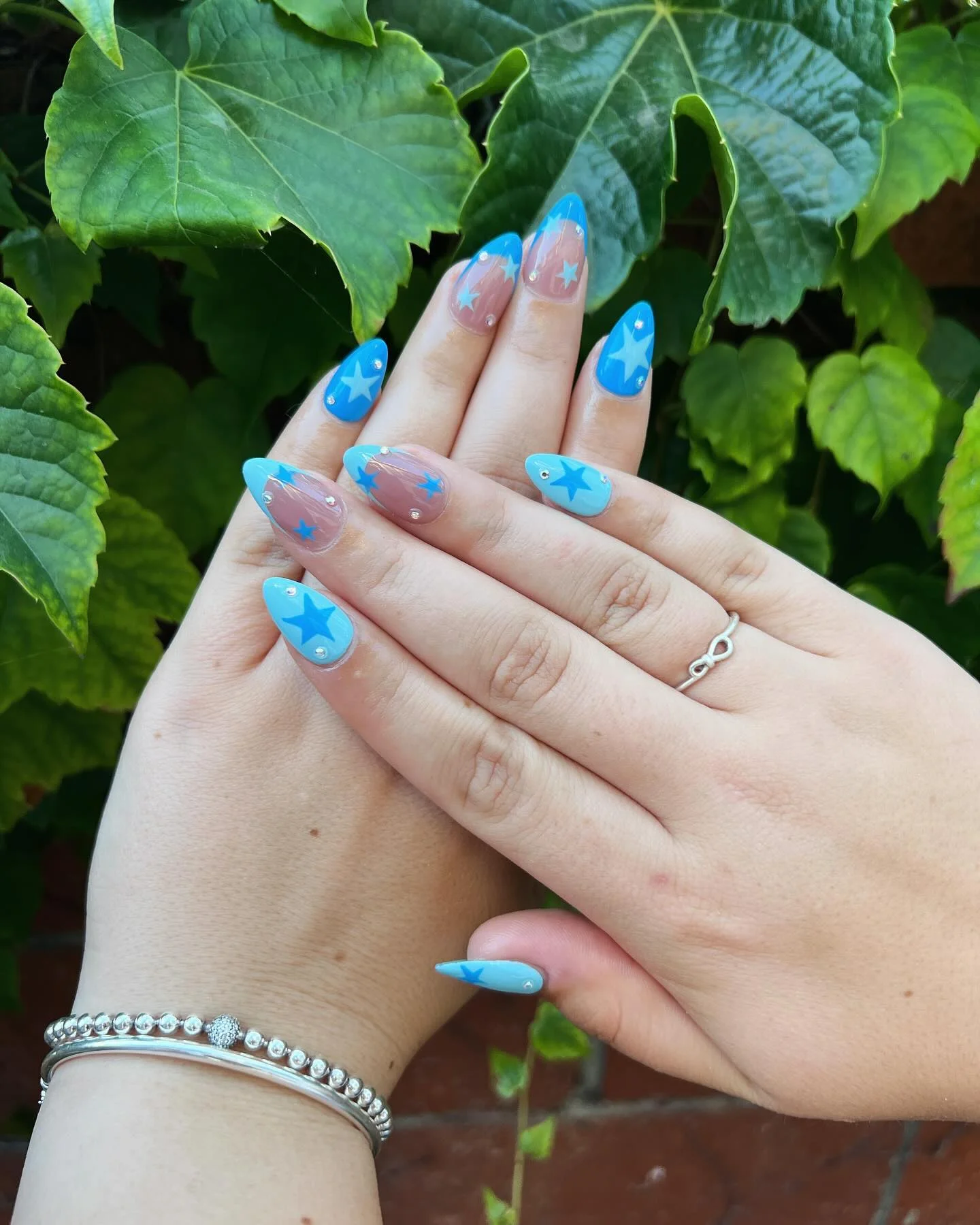 light blue summer nails 2026 Sky Blue Starry Almond Nails With Y2K Energy