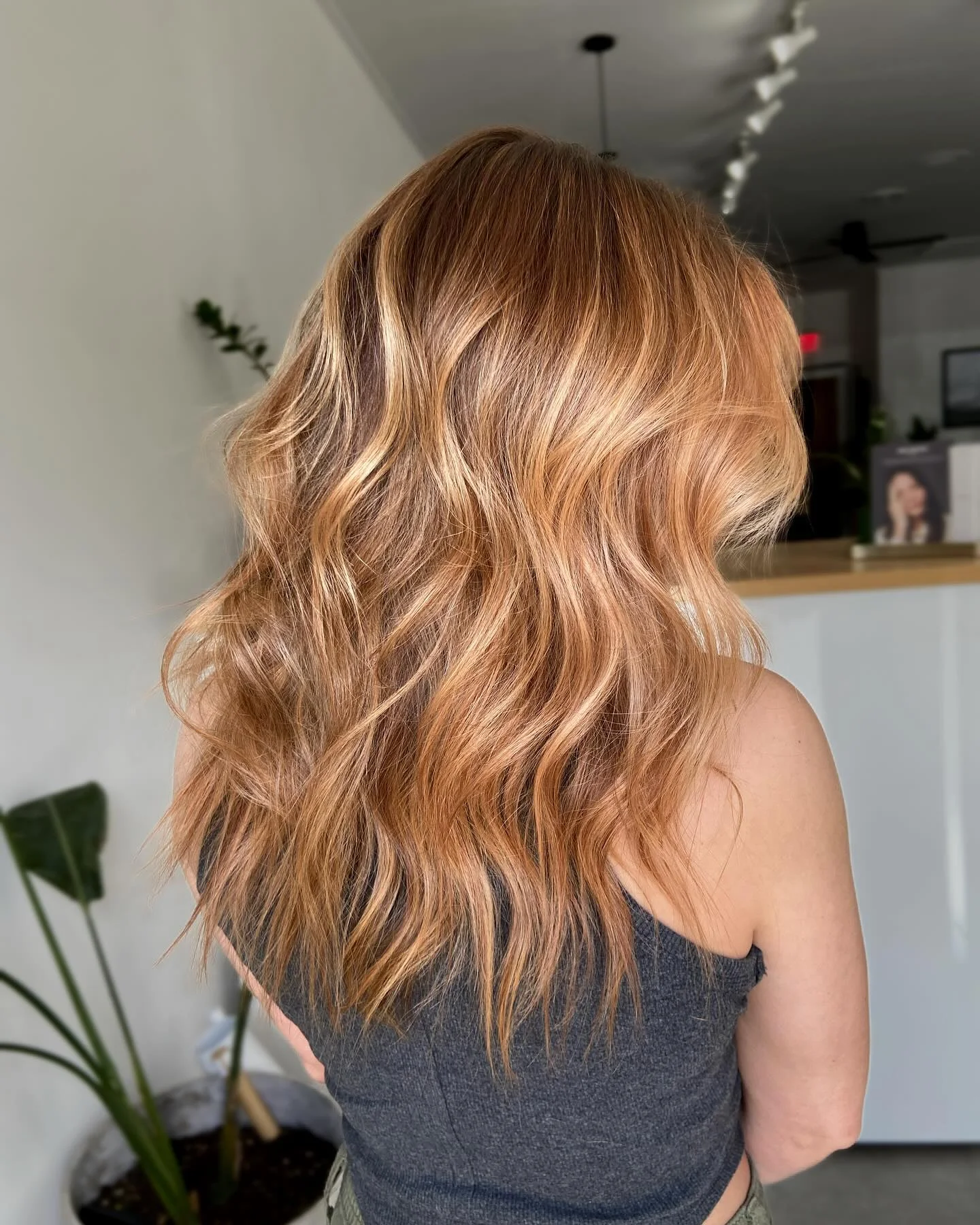 lived-in summer strawberry blonde hair color 2026 Soft Copper Melt With Effortless Beach Waves
