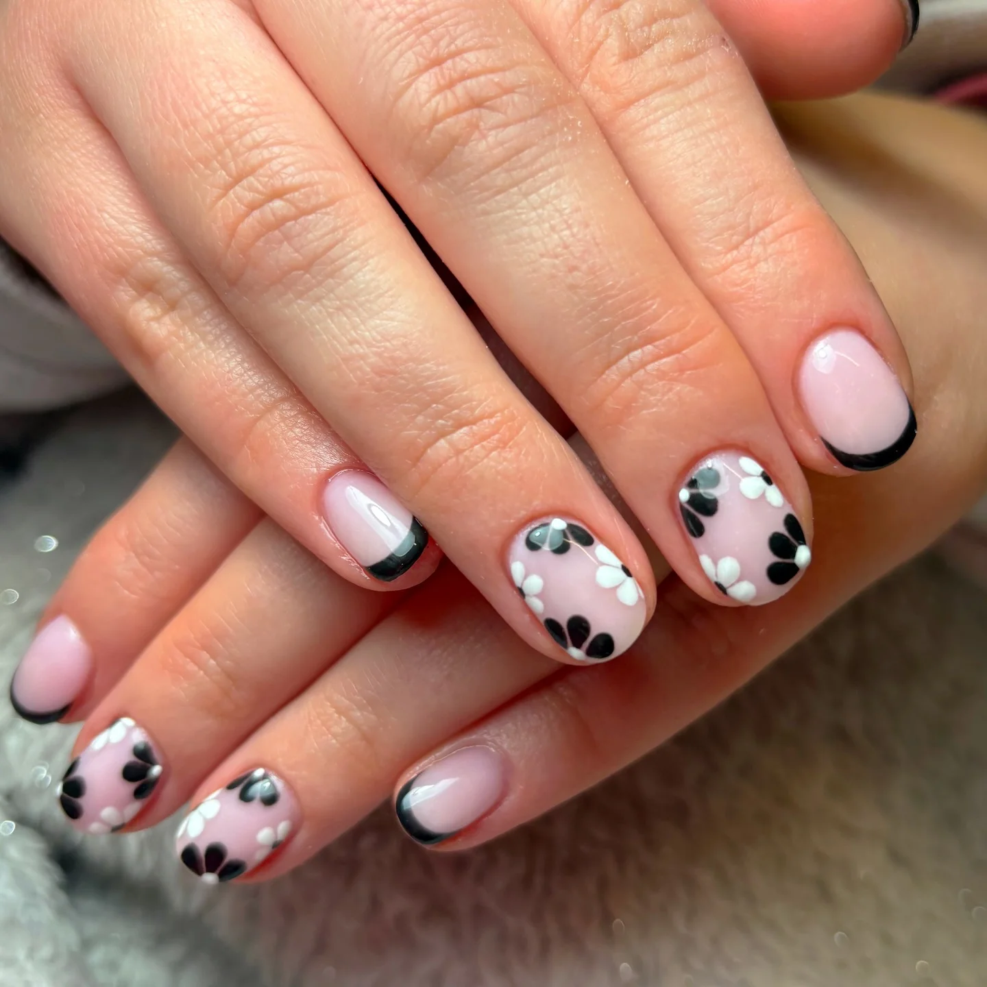short squoval nails design 2026 Black Daisy French Tips For A Modern Classy Look