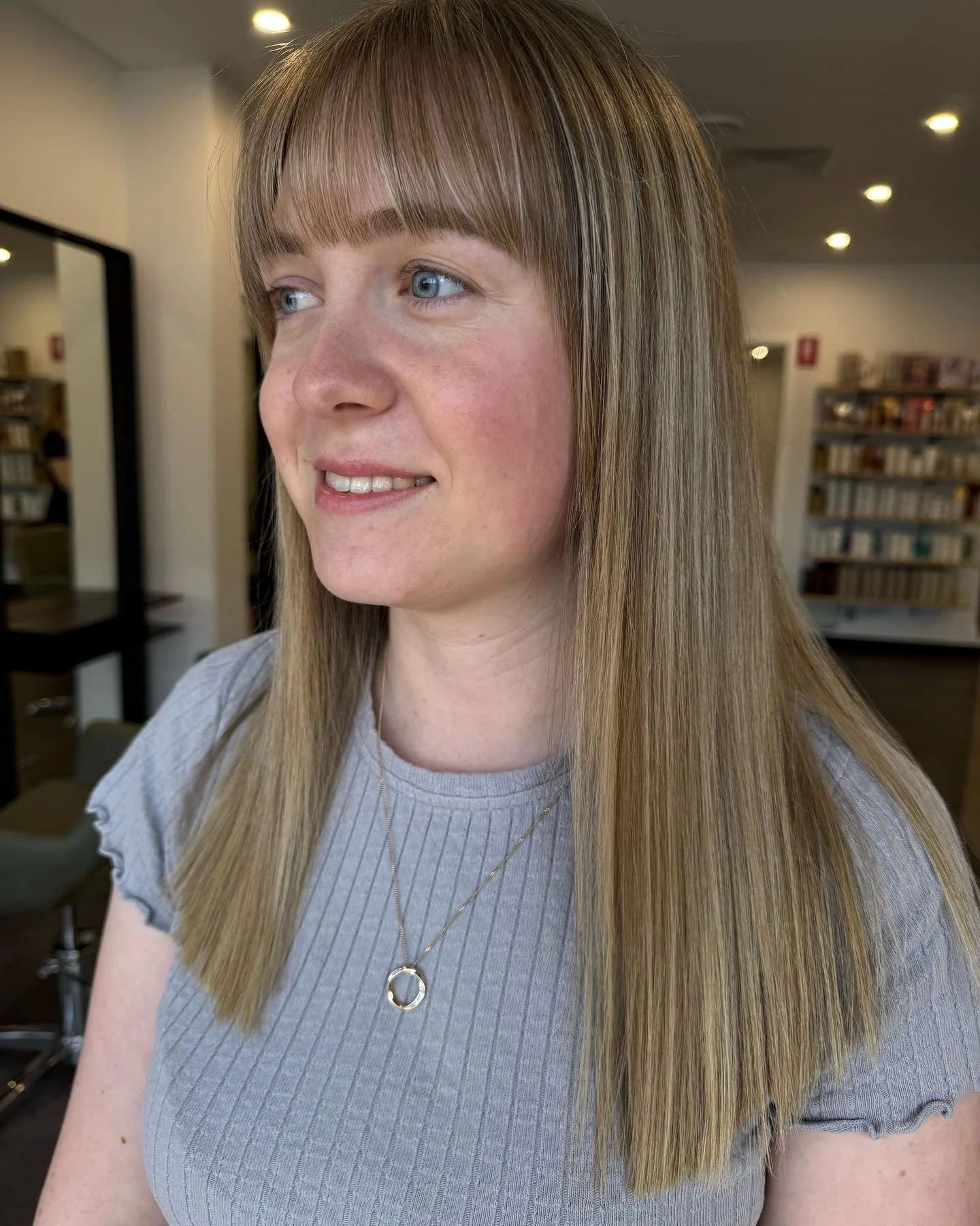 sophisticated summer haircuts for women over 40 2026 Soft Blonde Precision Cut With Airy Bangs
