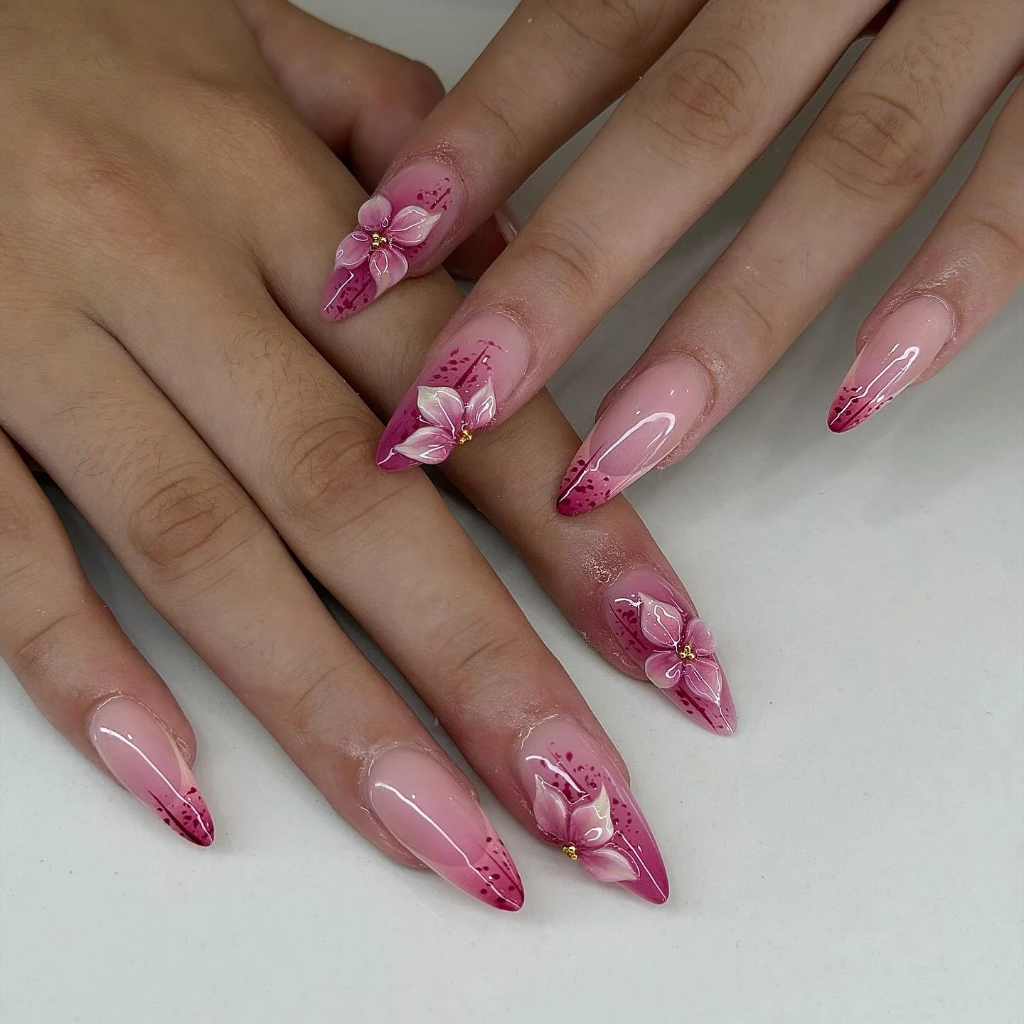 summer acrylic nails 2026 Glossy Pink Petal Tips With Romantic Floral Accents