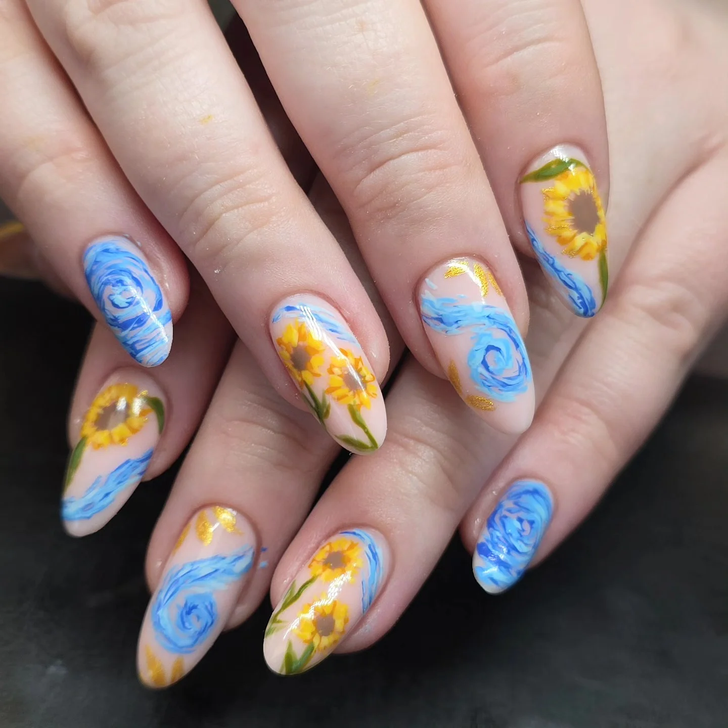 summer nail art 2026 Sunflower Swirls And Painterly Blue Waves