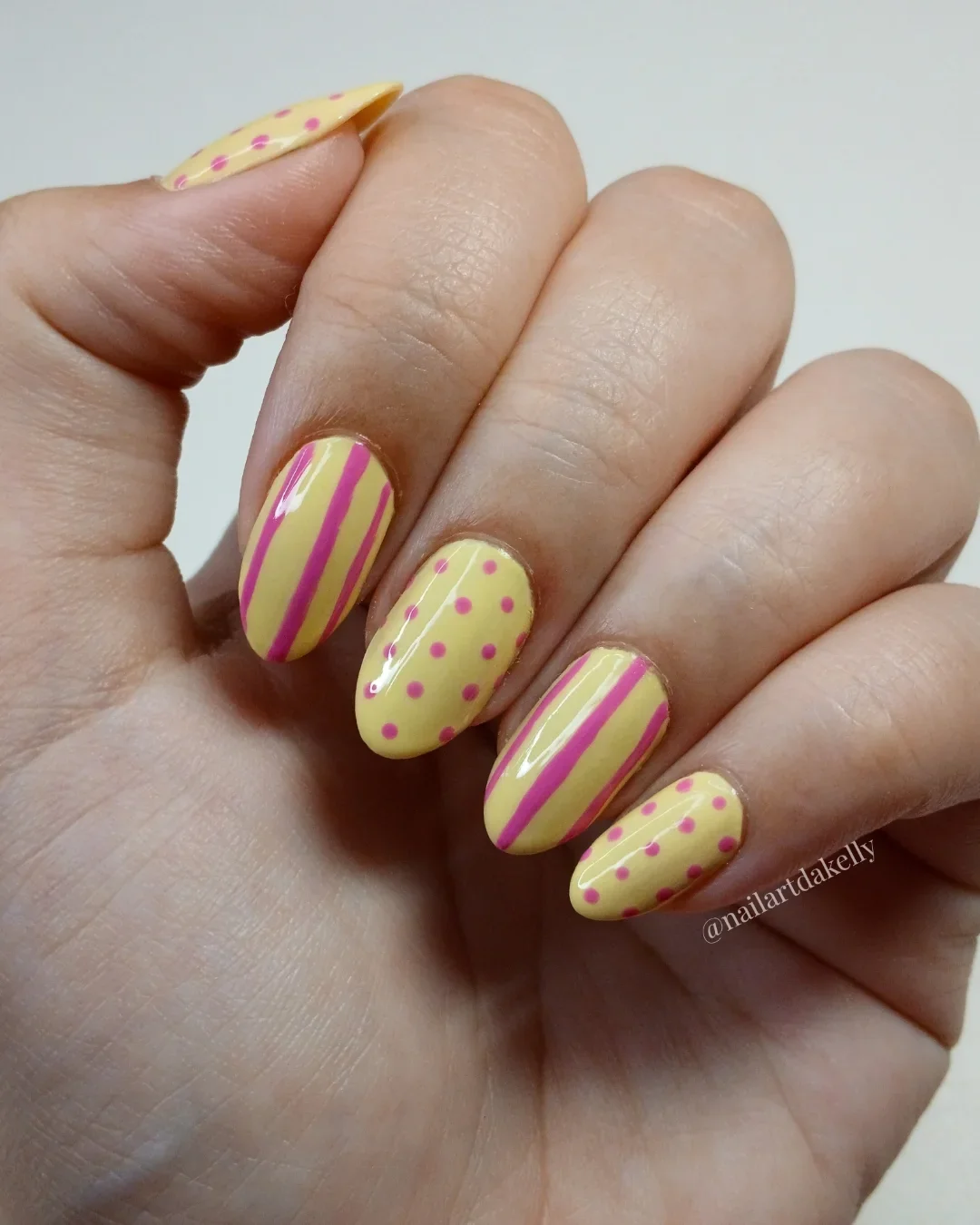 summer yellow nails 2026 Butter Lemon Nails With Playful Pink Graphic Details