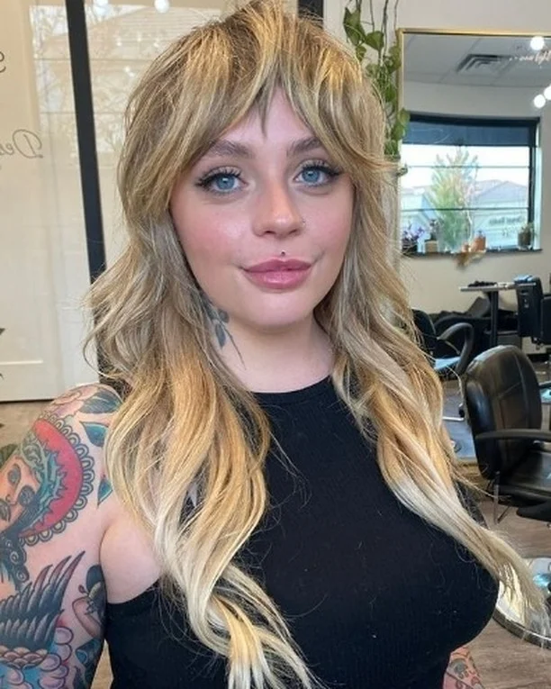 edgy summer shag hairstyle 2026 Butter Blonde Rockstar Layers With Soft Curtain Fringe