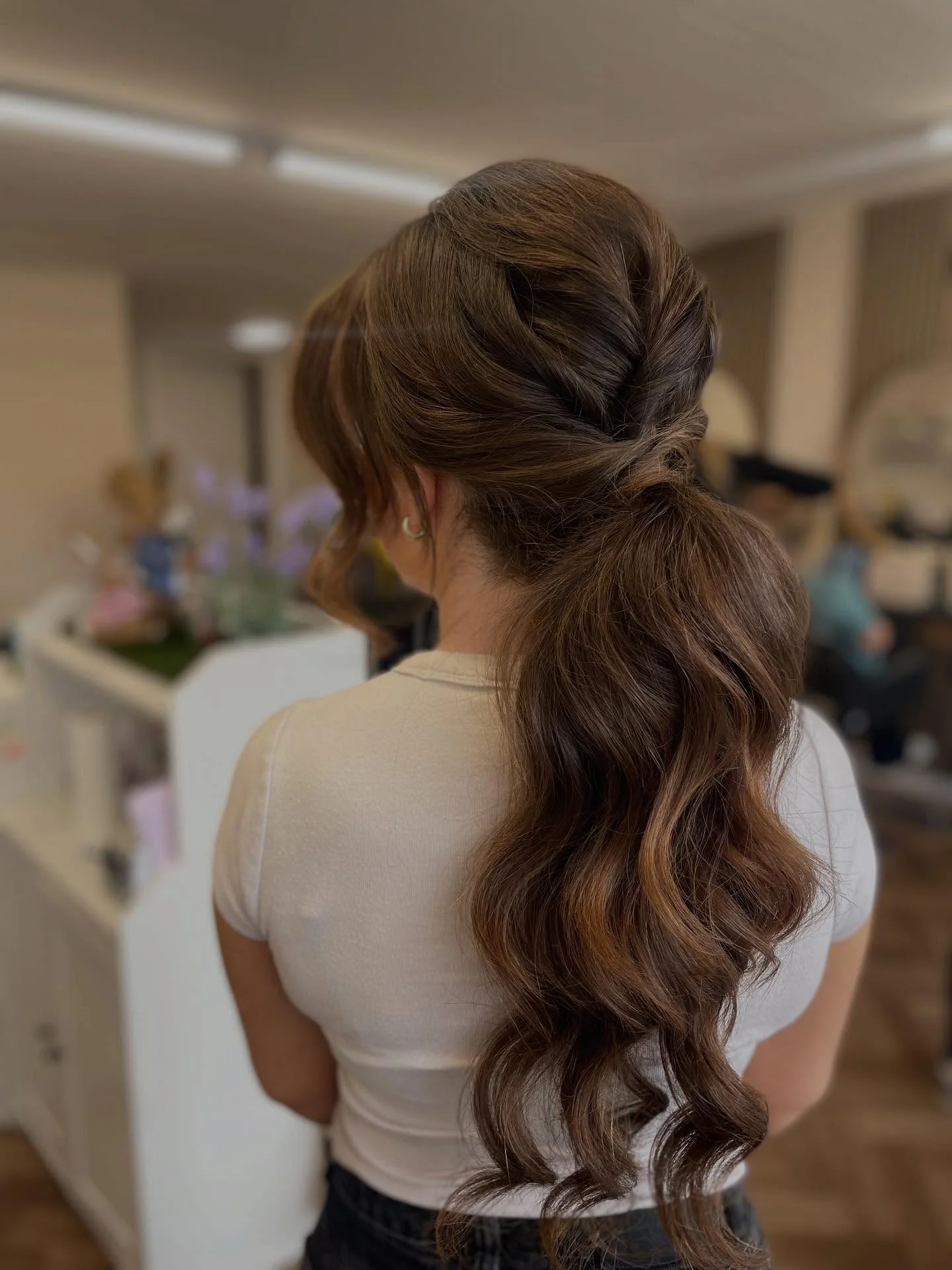 polished summer ponytail hairstyle 2026 Romantic Twisted Ponytail With Loose Summer Texture
