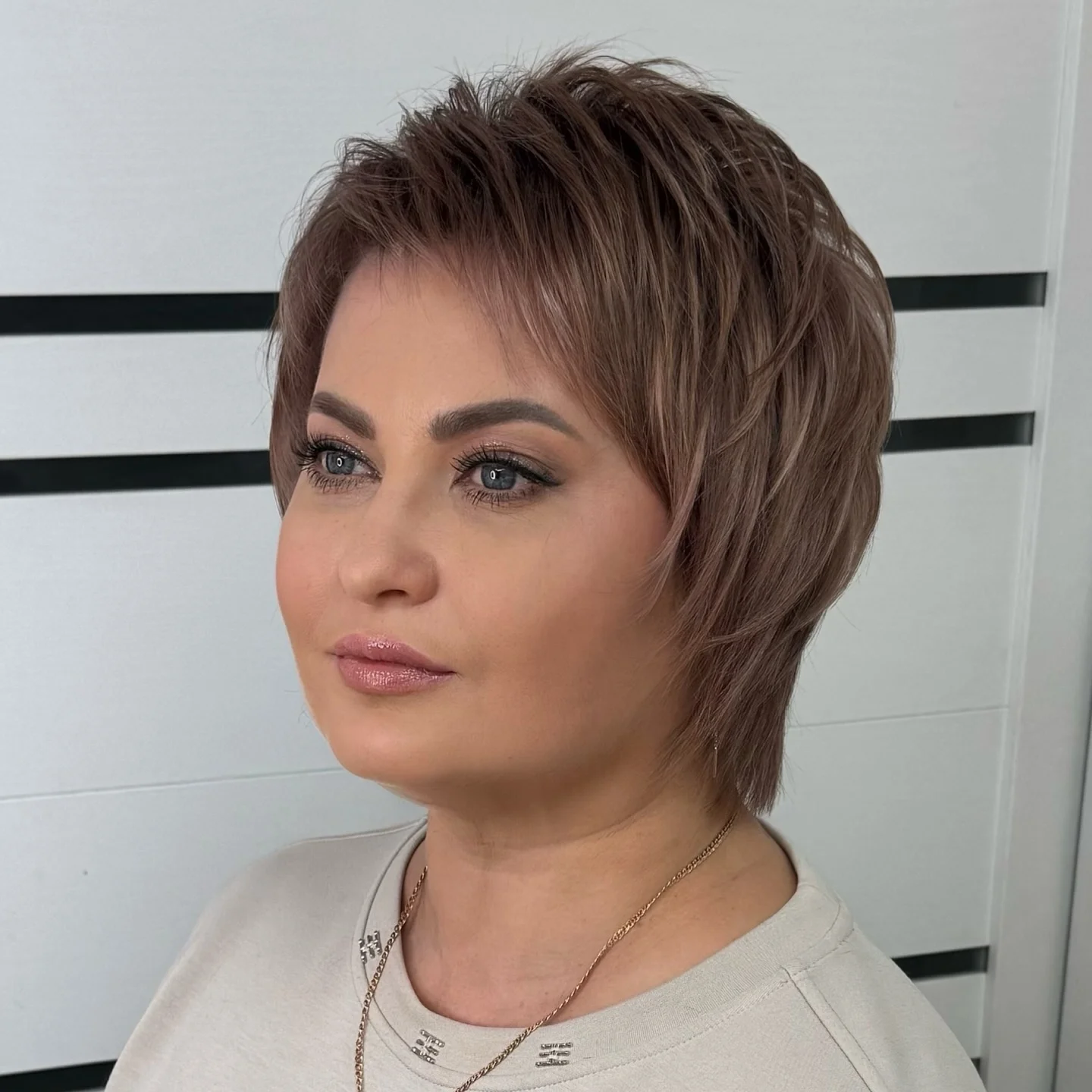 summer-haircuts-women-over-50 Textured Short Pixie With Lifted Crown