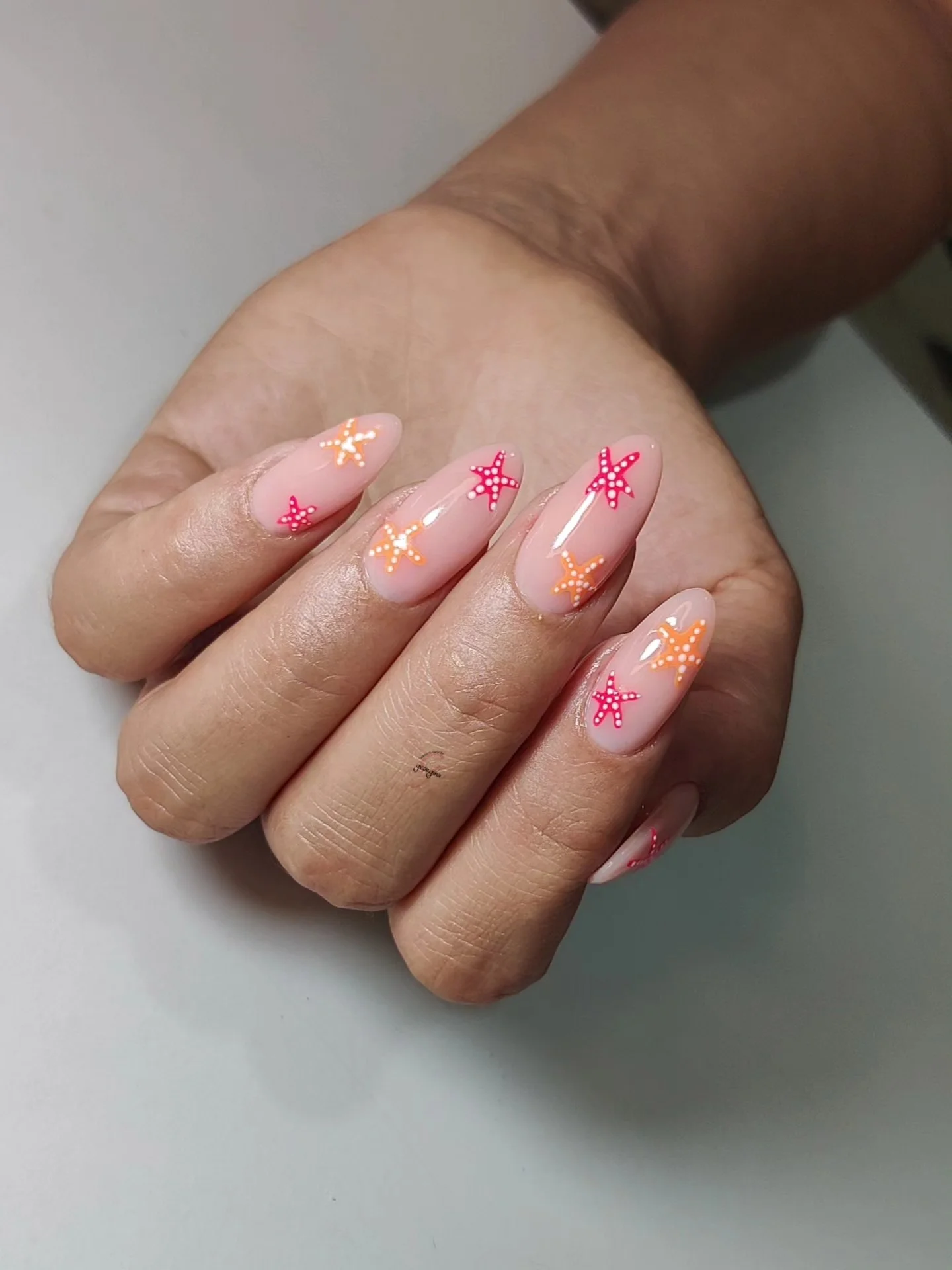 summer beach nails 2026 Glossy Starfish Nails With Sunset Pink Energy