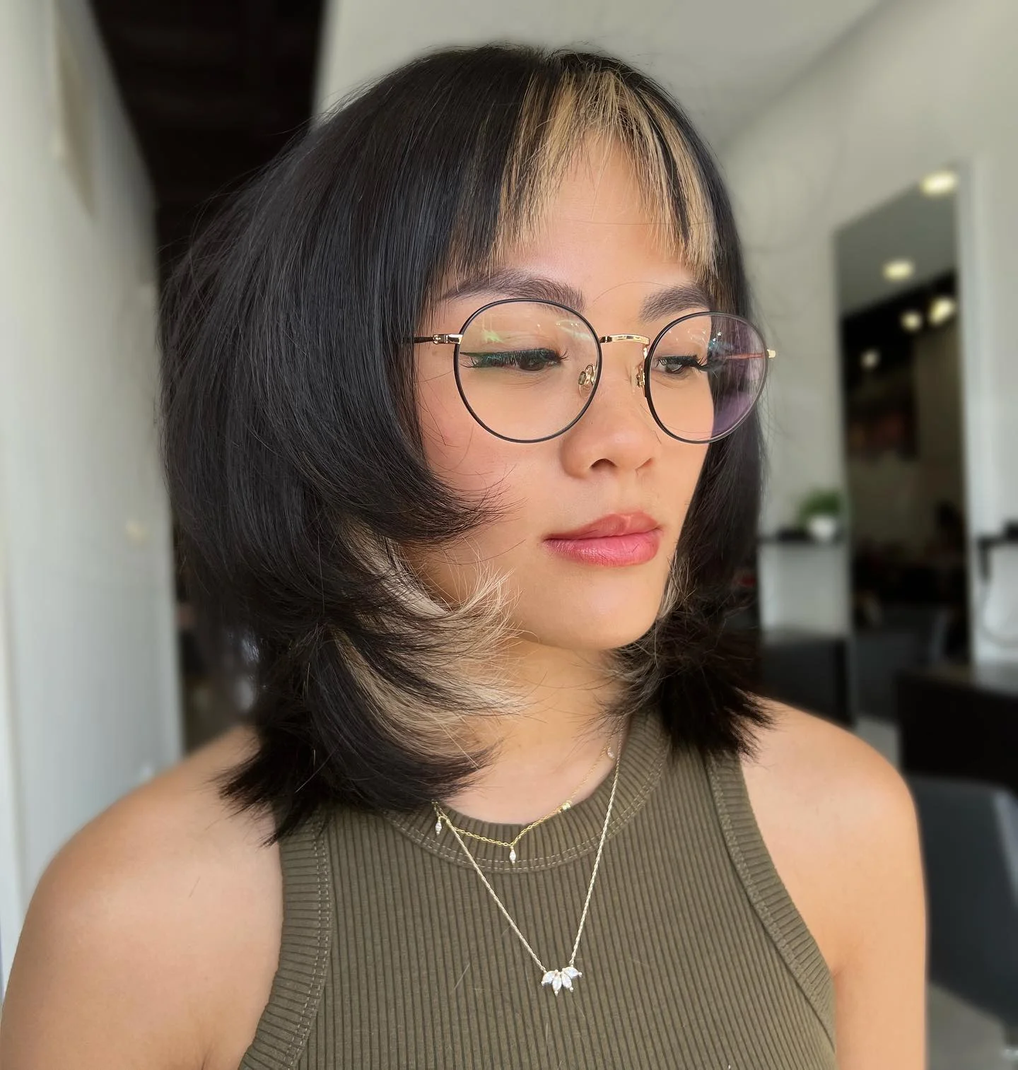 edgy summer shag hairstyle 2026 Graphic Bob Shag With Blonde Money Piece Contrast