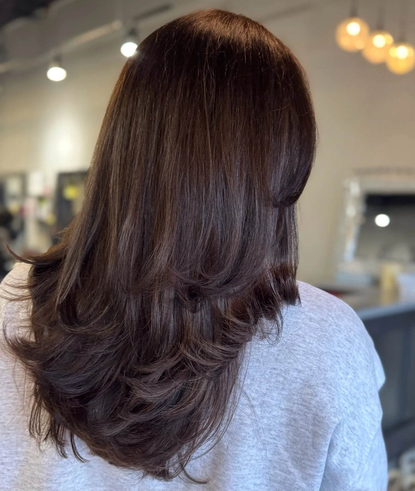 modern summer espresso brunette hair color 2026 Layered Chocolate Espresso Blowout