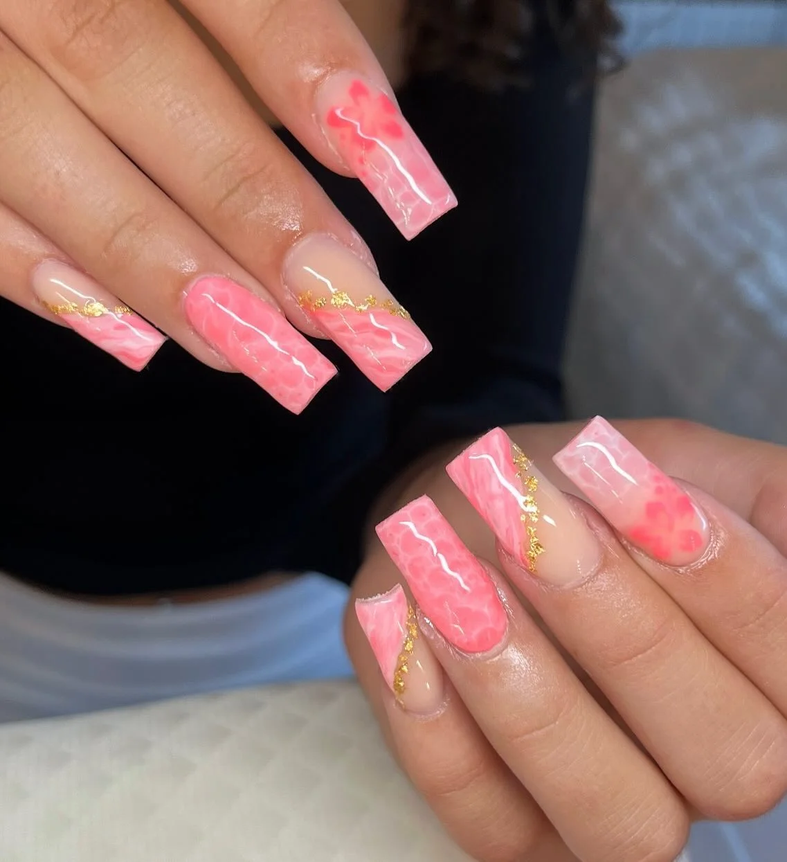 pink summer nails 2026 Glossy Pink Marble Nails With Gold Accents