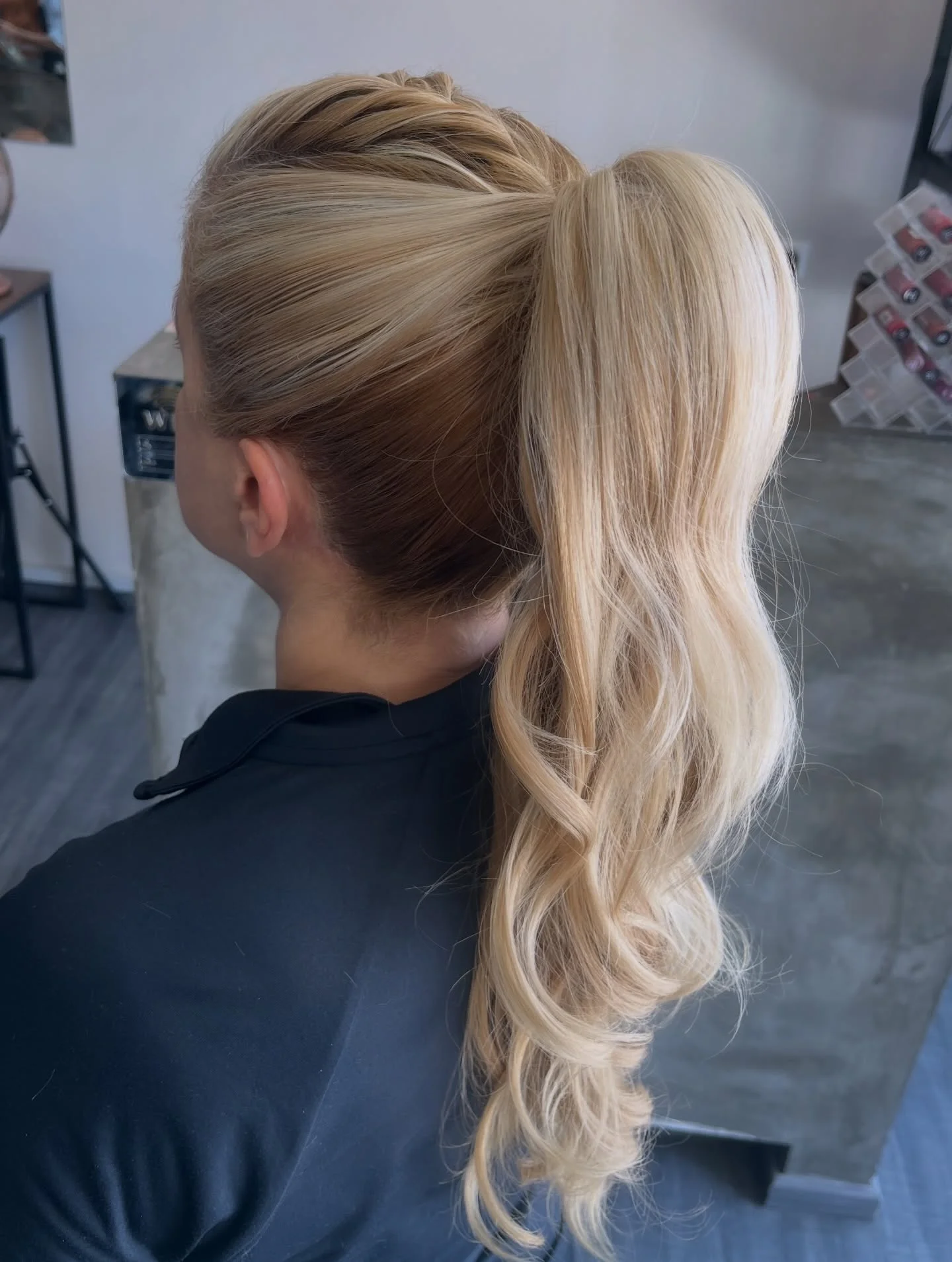 polished summer ponytail hairstyle 2026 Ultra Sleek Blonde Ponytail With Braided Crown Detail