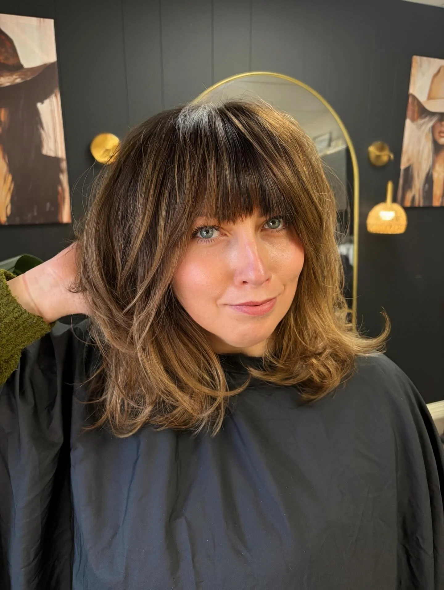 sophisticated summer haircuts for women over 40 2026 Layered Voluminous Blowout With Full Fringe