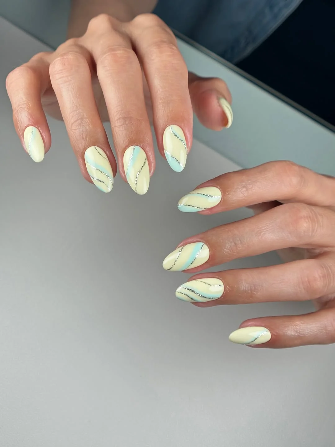 summer yellow nails 2026 Pastel Swirl Nails With Delicate Silver Accents