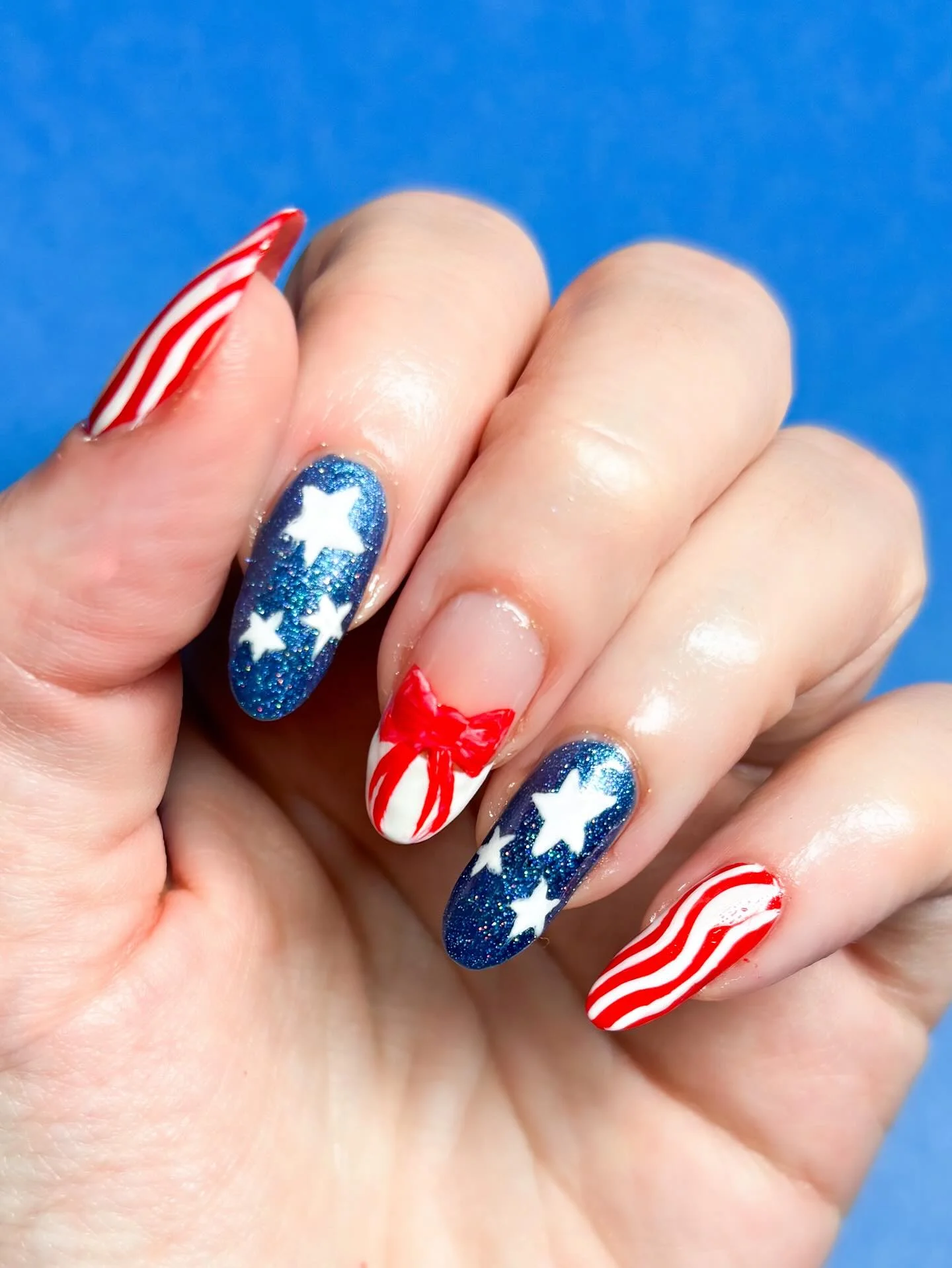 4th of july nails 2026 Firework Sparkle Nails With Candy Stripe Details