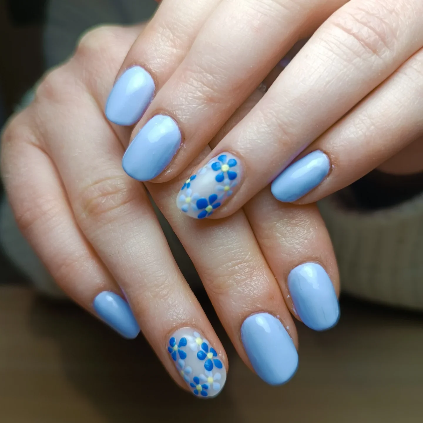 light blue summer nails 2026 Minimal Blue Daisy Nails With Scandinavian Summer Energy