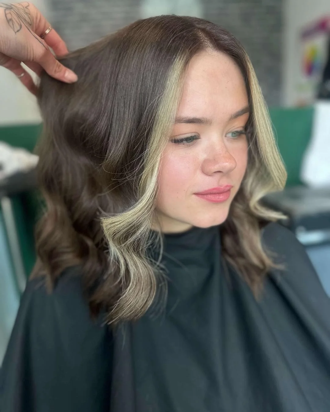 platinum summer money piece hair color 2026 Short Brunette Waves With Bold Platinum Money Piece
