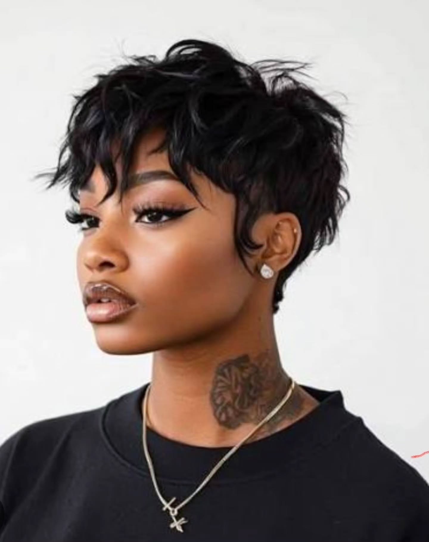regal summer hairstyle black women 2026 Textured Pixie With Piecey Layers