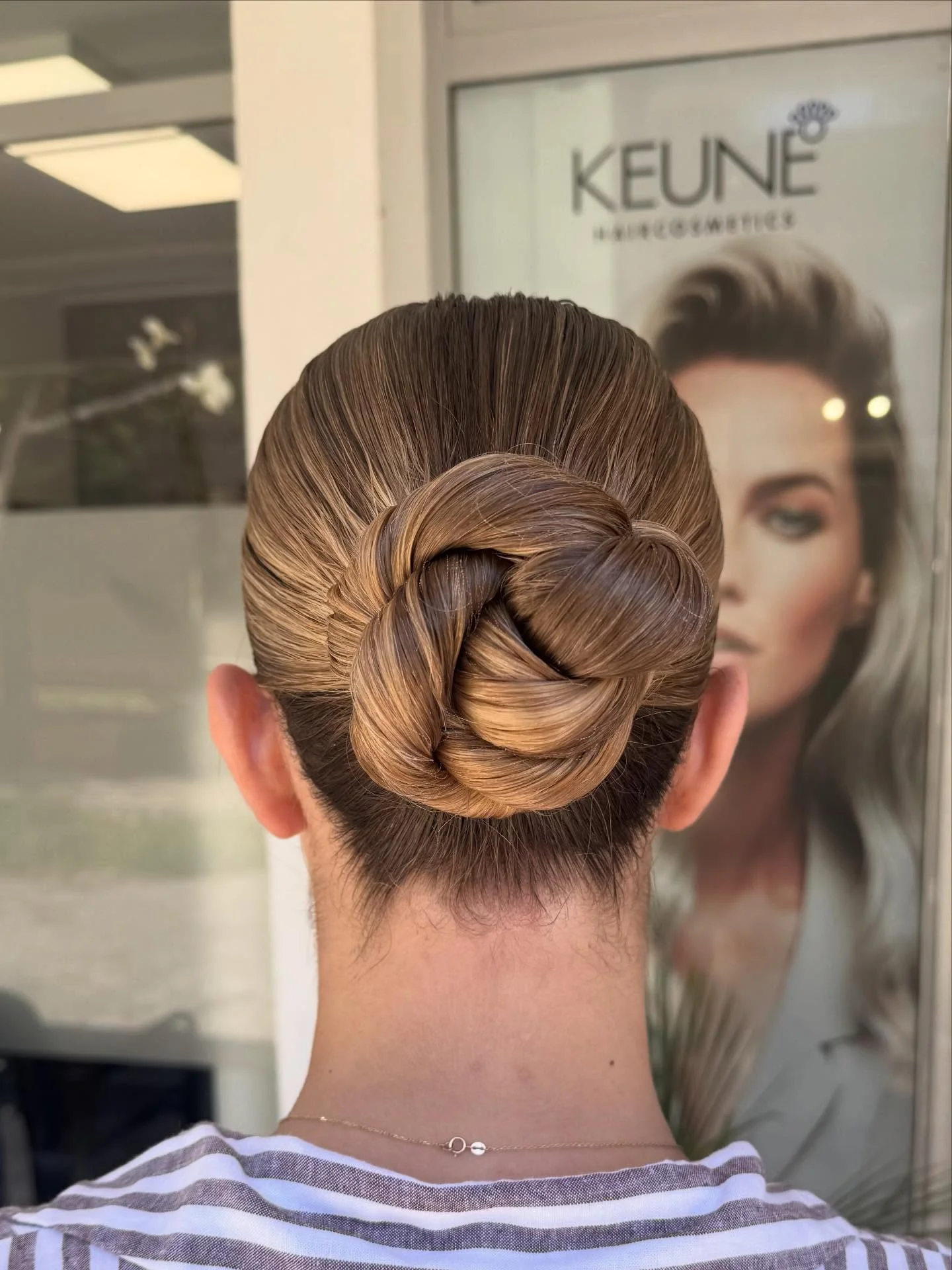 summer hairstyles ideas 2026 Sculpted Glossy Bun With Minimalist Luxury Energy