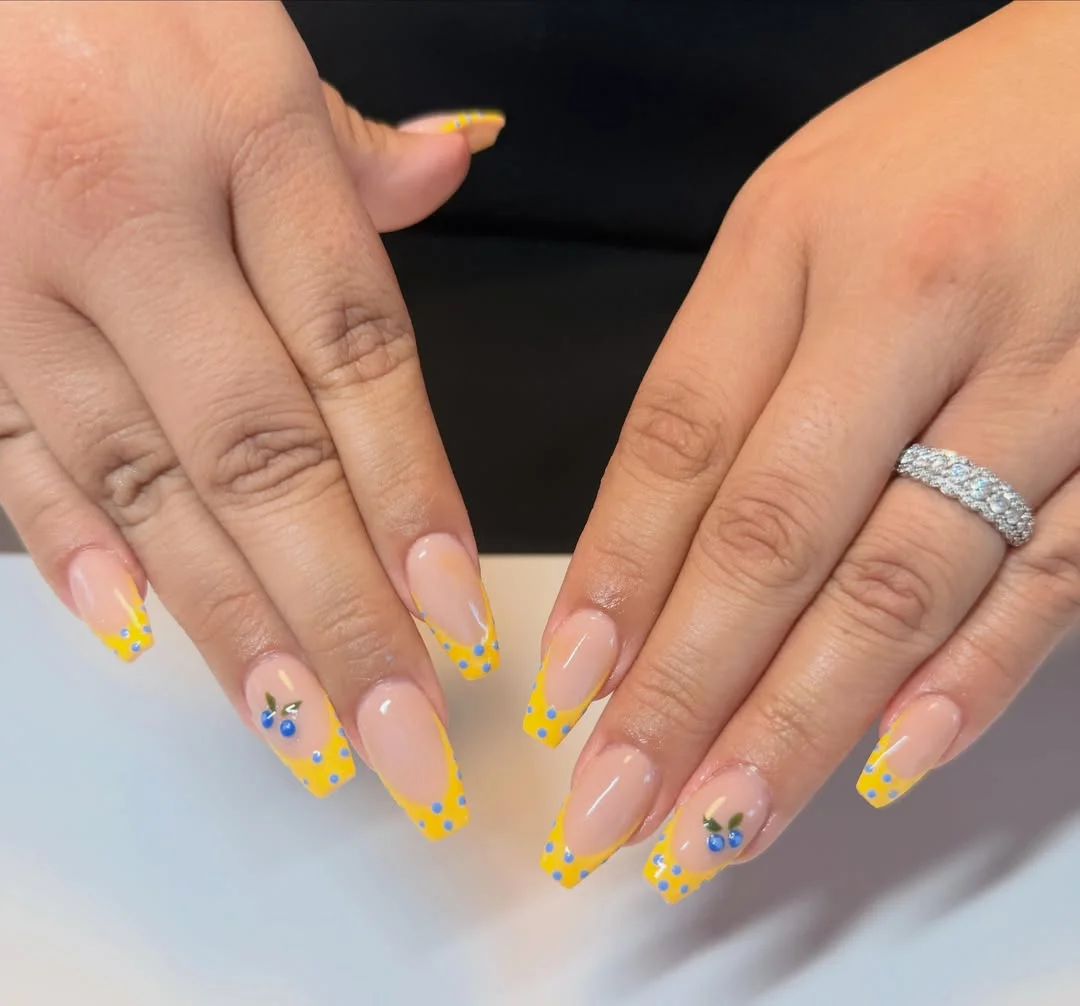 trendy summer nails 2026 Sunny French Tips With Retro Citrus Dot Details