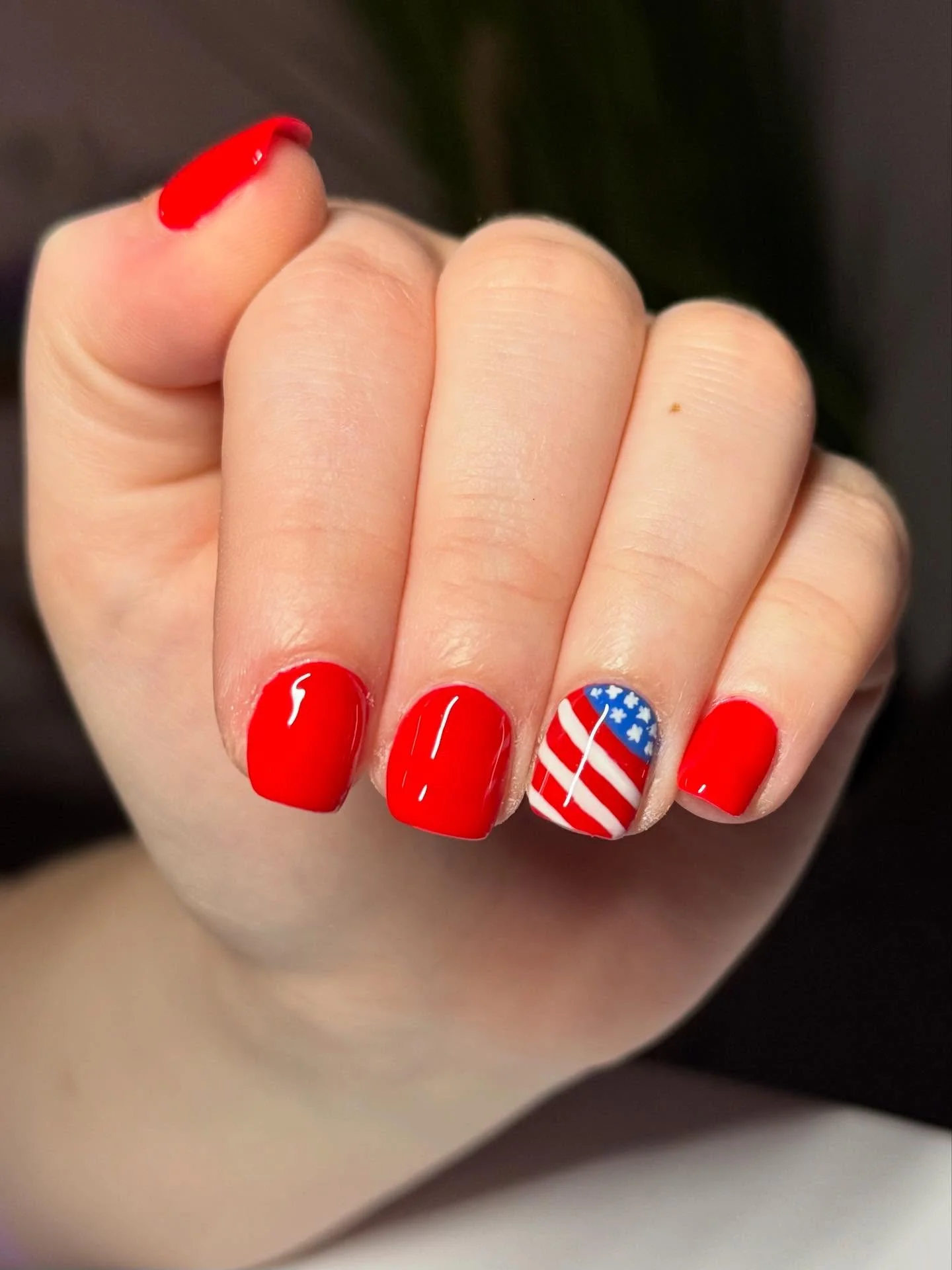 usa nails 2026 Classic Cherry Red Nails With A Tiny Americana Accent