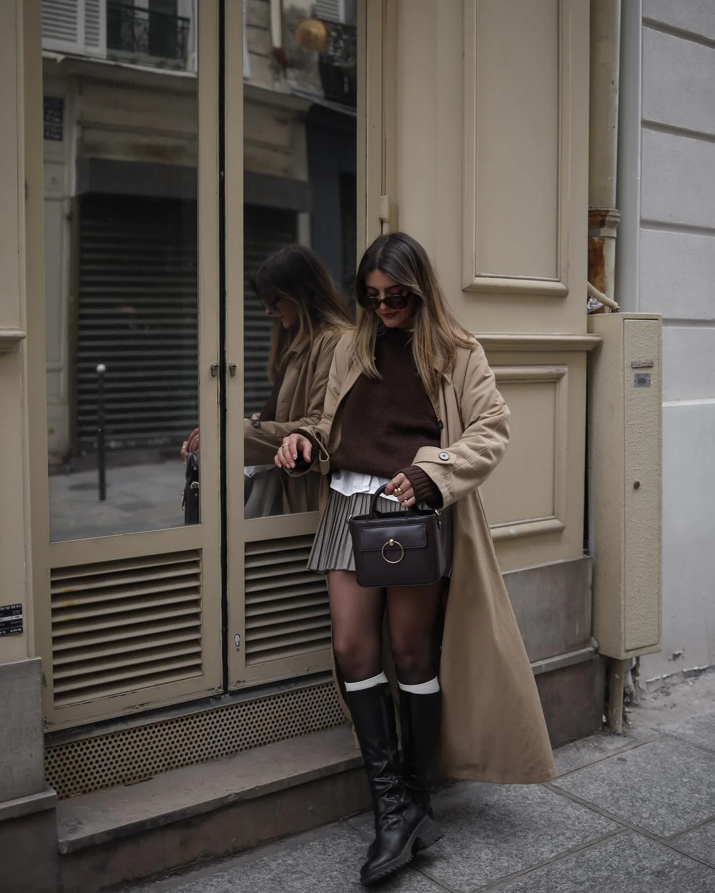 fall outfits with tights 2026 Parisian Neutrals With Tall Boots And Pleated Mini Skirts