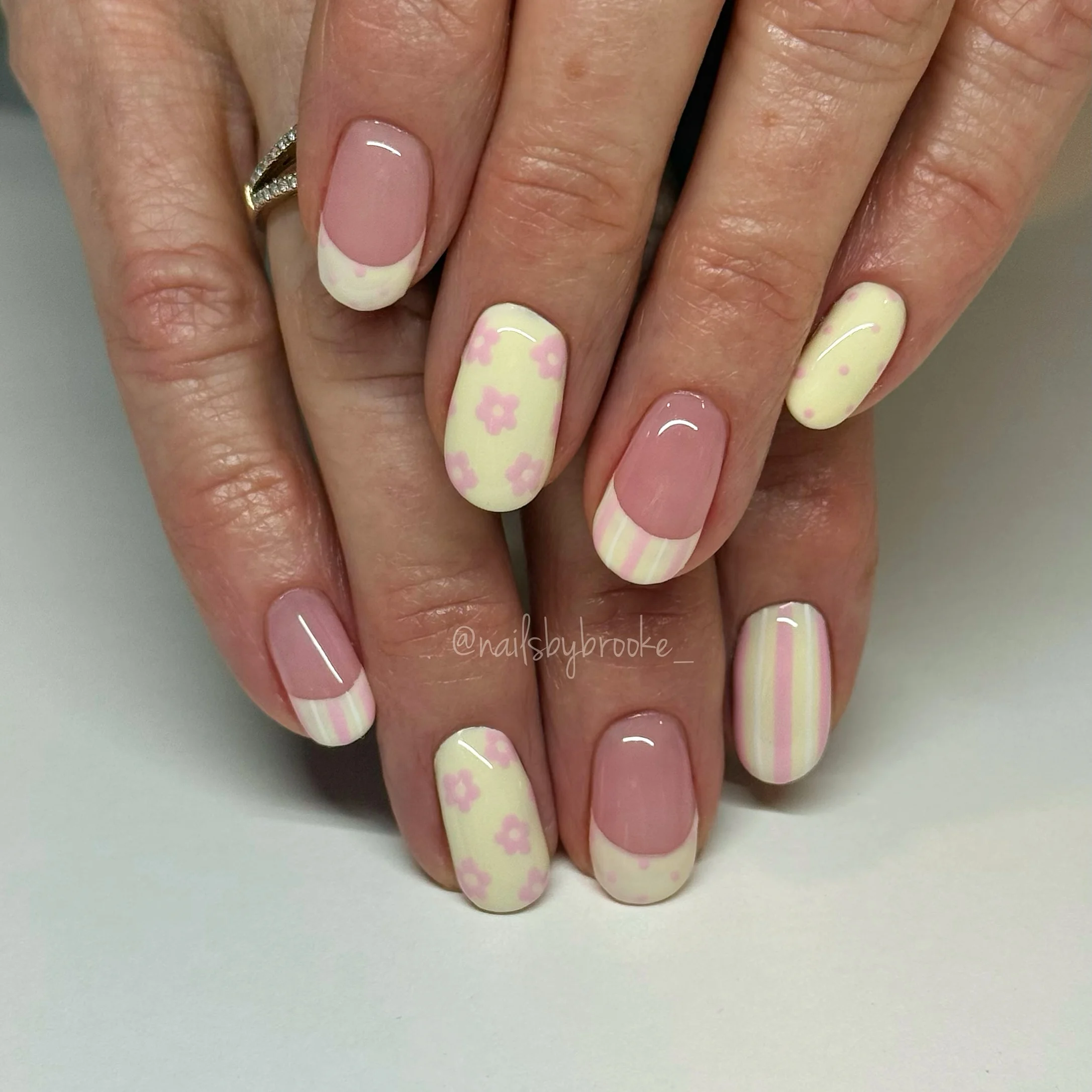 june manicure ideas 2026 Soft Daisy French With Pastel Charm