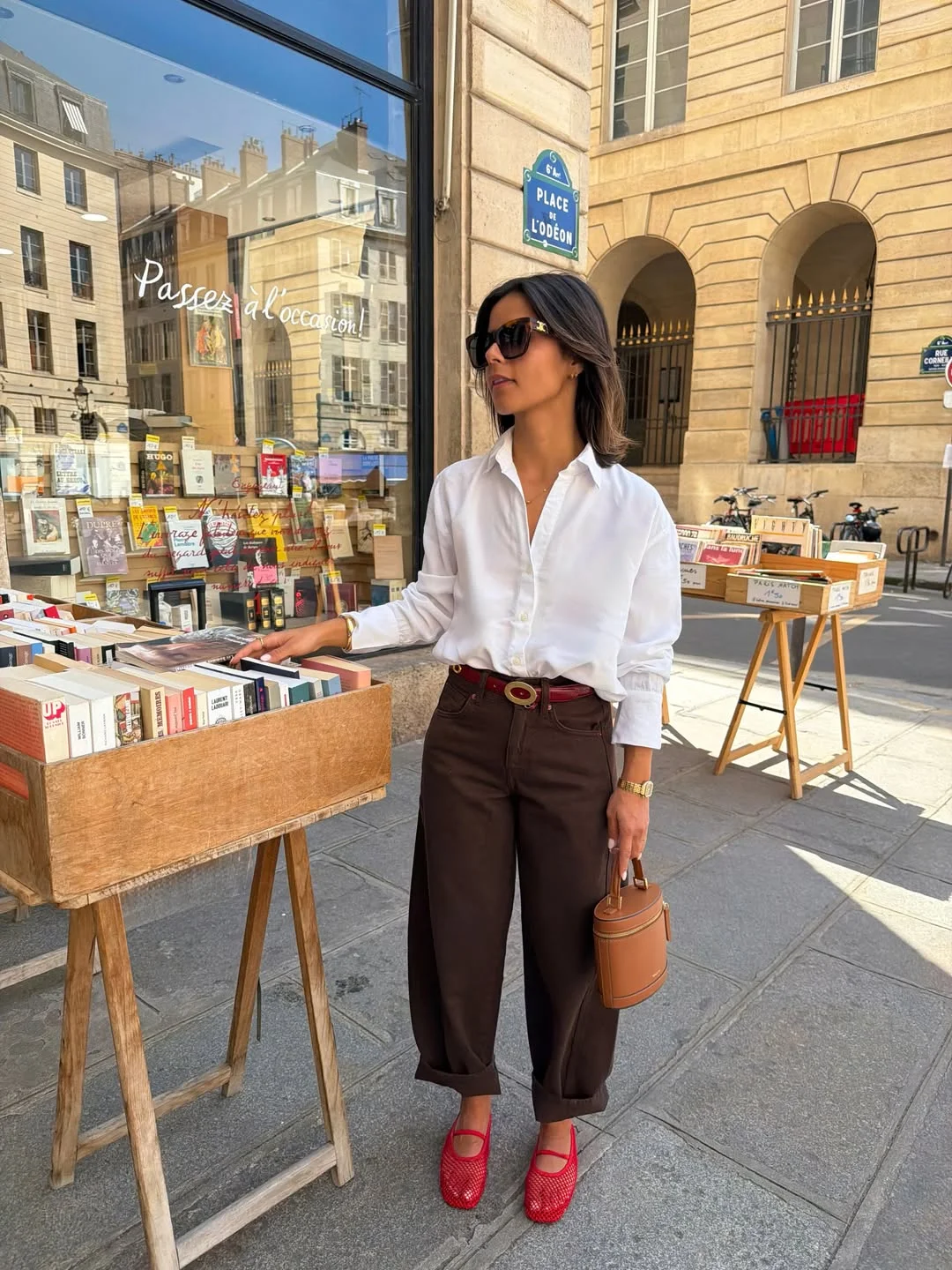 early summer outfits 2026 Parisian Chocolate Tones With Statement Red Flats