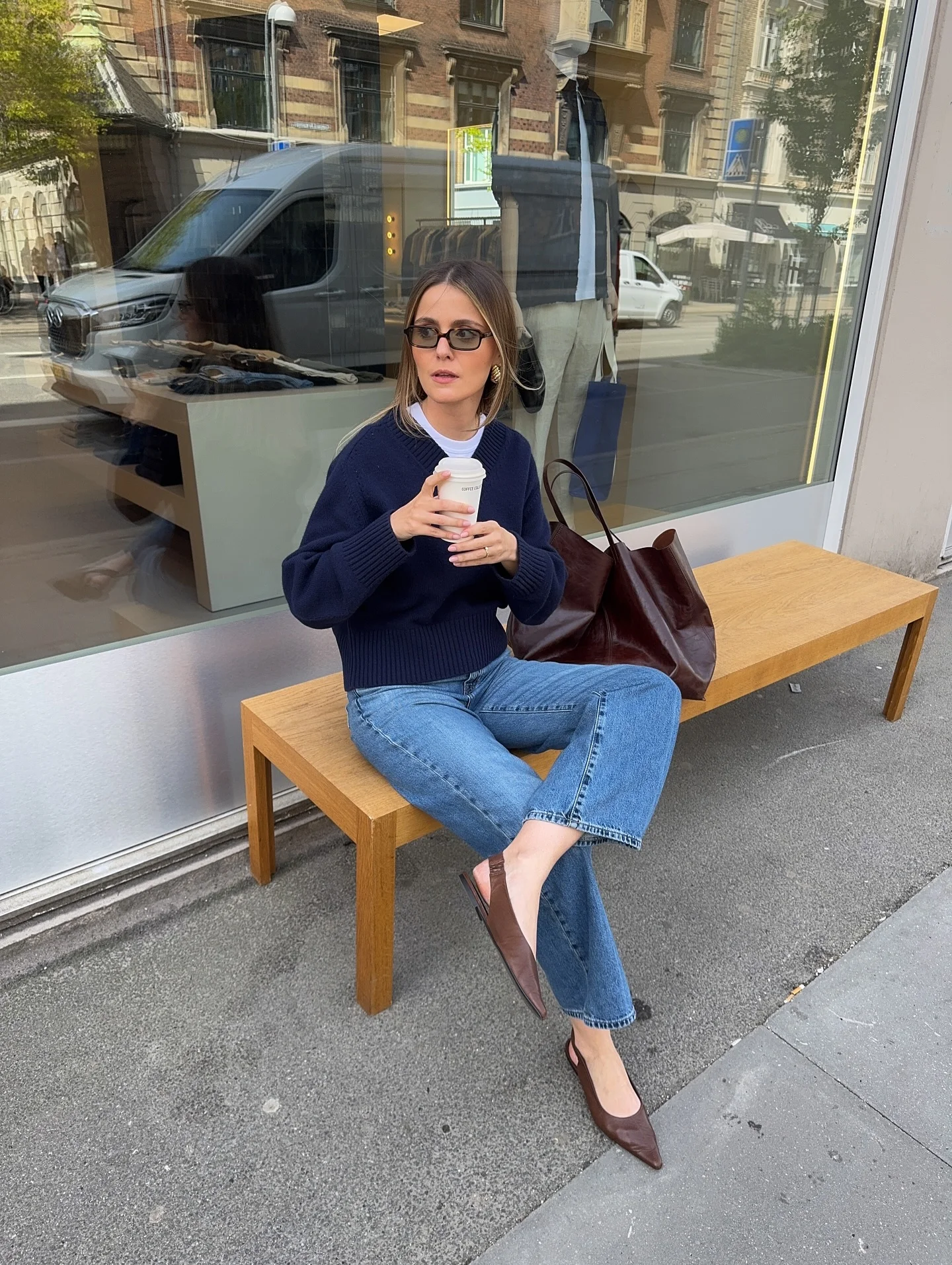 fall denim fashion outfits 2026 Navy Sweater And Straight-Leg Jeans With Parisian Simplicity