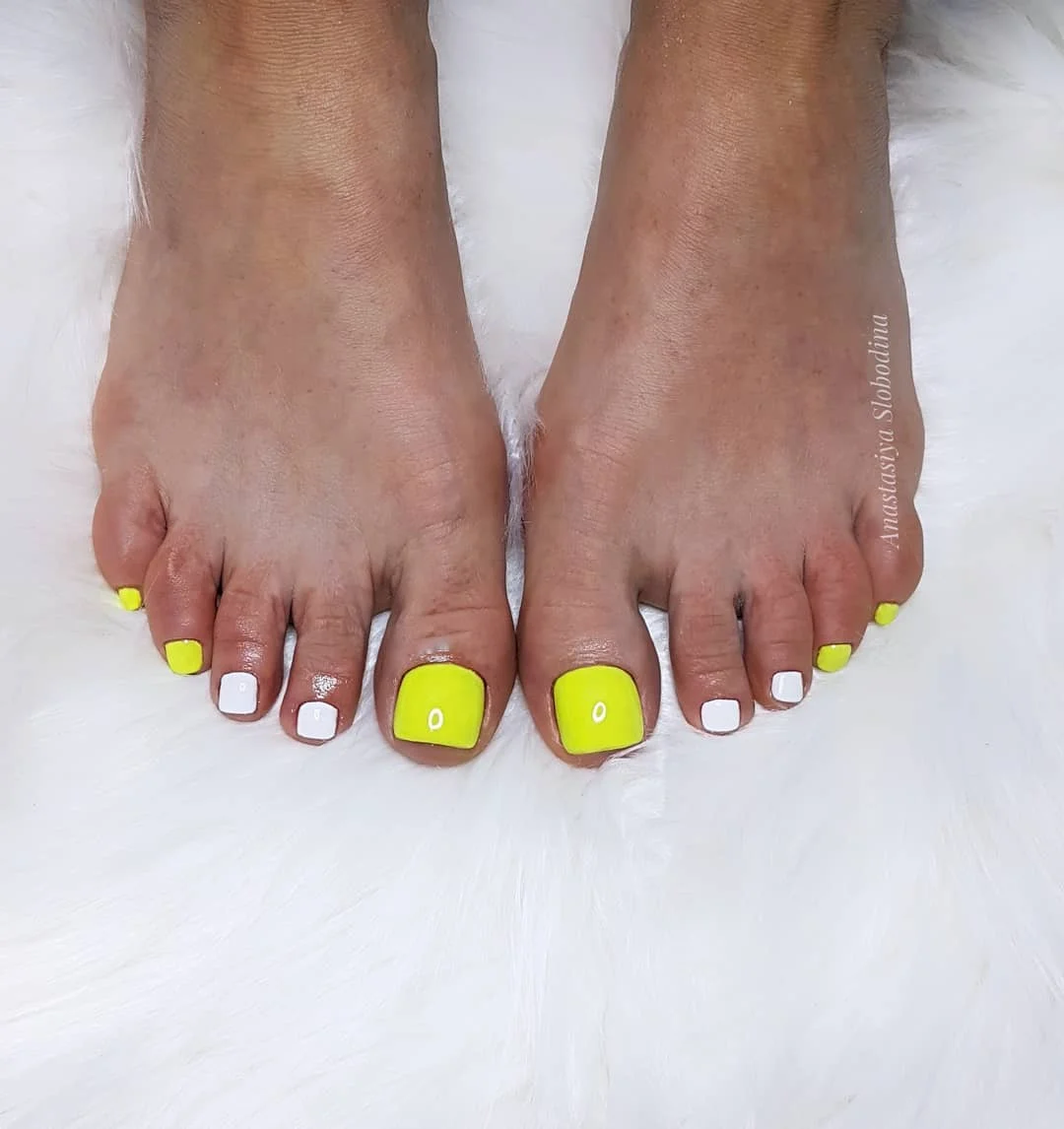 july toe nail colors ideas 2026 Neon Yellow And White Color Block Summer Pedicure