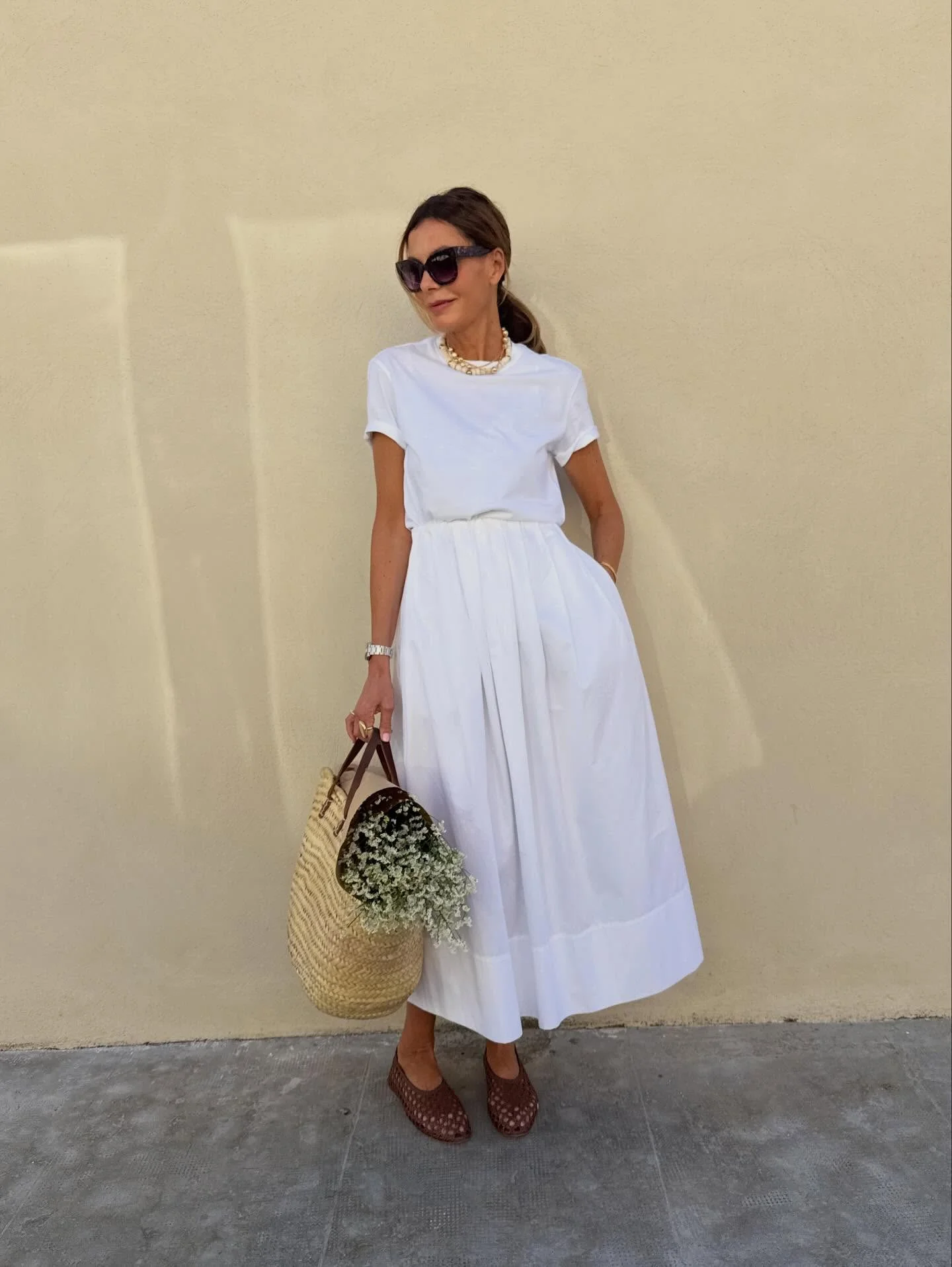 july fashion trends 2026 All White Elegance Defines Quiet Luxury Summer Style