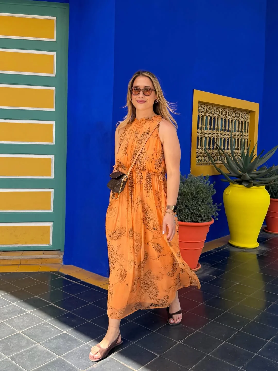 july outfits ideas 2026 Sunset Orange Maxi Dress With Artistic Details