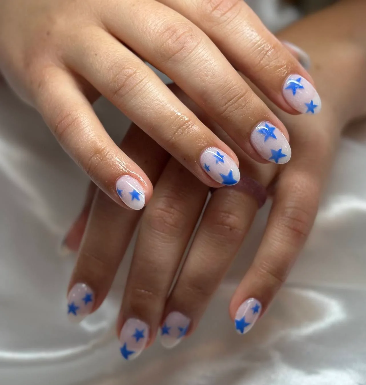 july nails design ideas 2026 Blue Star Nails For A Minimalist Holiday Look