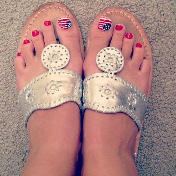 july toe nails design - summer ideas 2026 Minimalist Flag Accent Pedicure With Bright Red Polish
