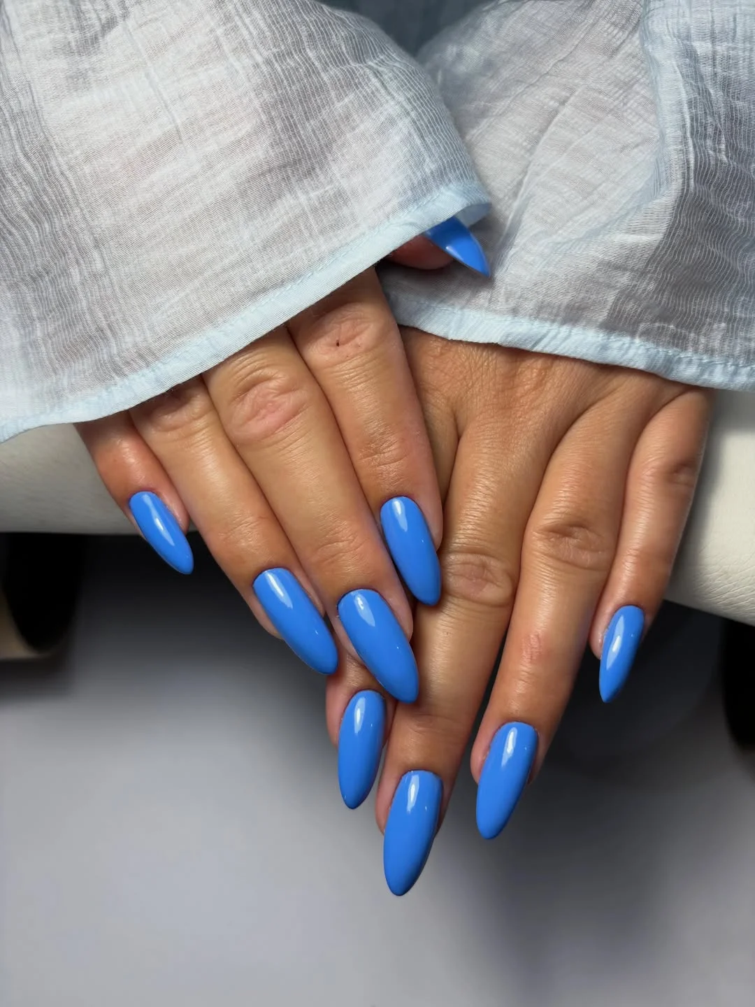 july nail colors ideas 2026 Cornflower Blue Almond Nails For Late Summer Elegance
