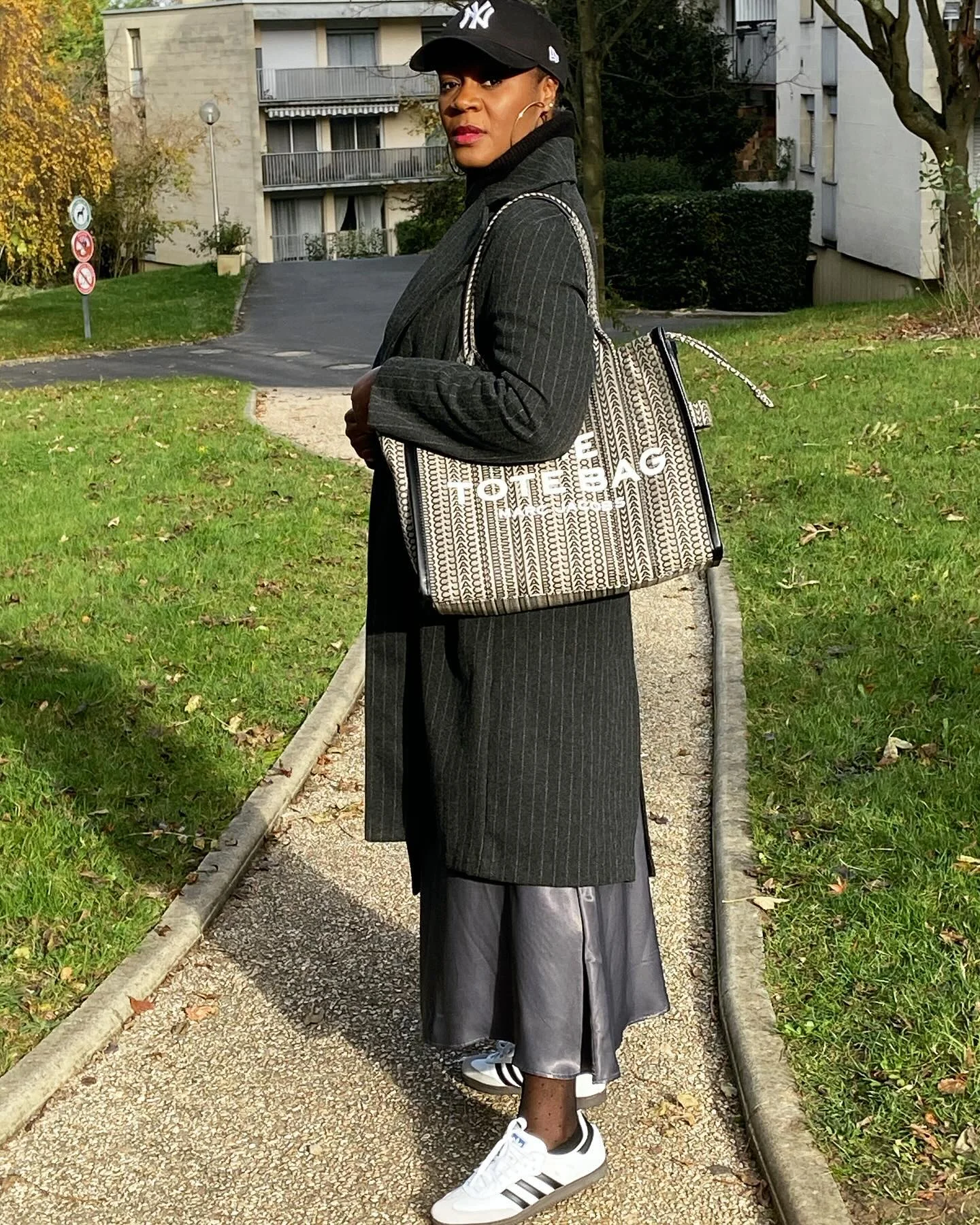 fall 2026 outfits for black women Pinstripe Coat And Satin Skirt With Sporty Street Style