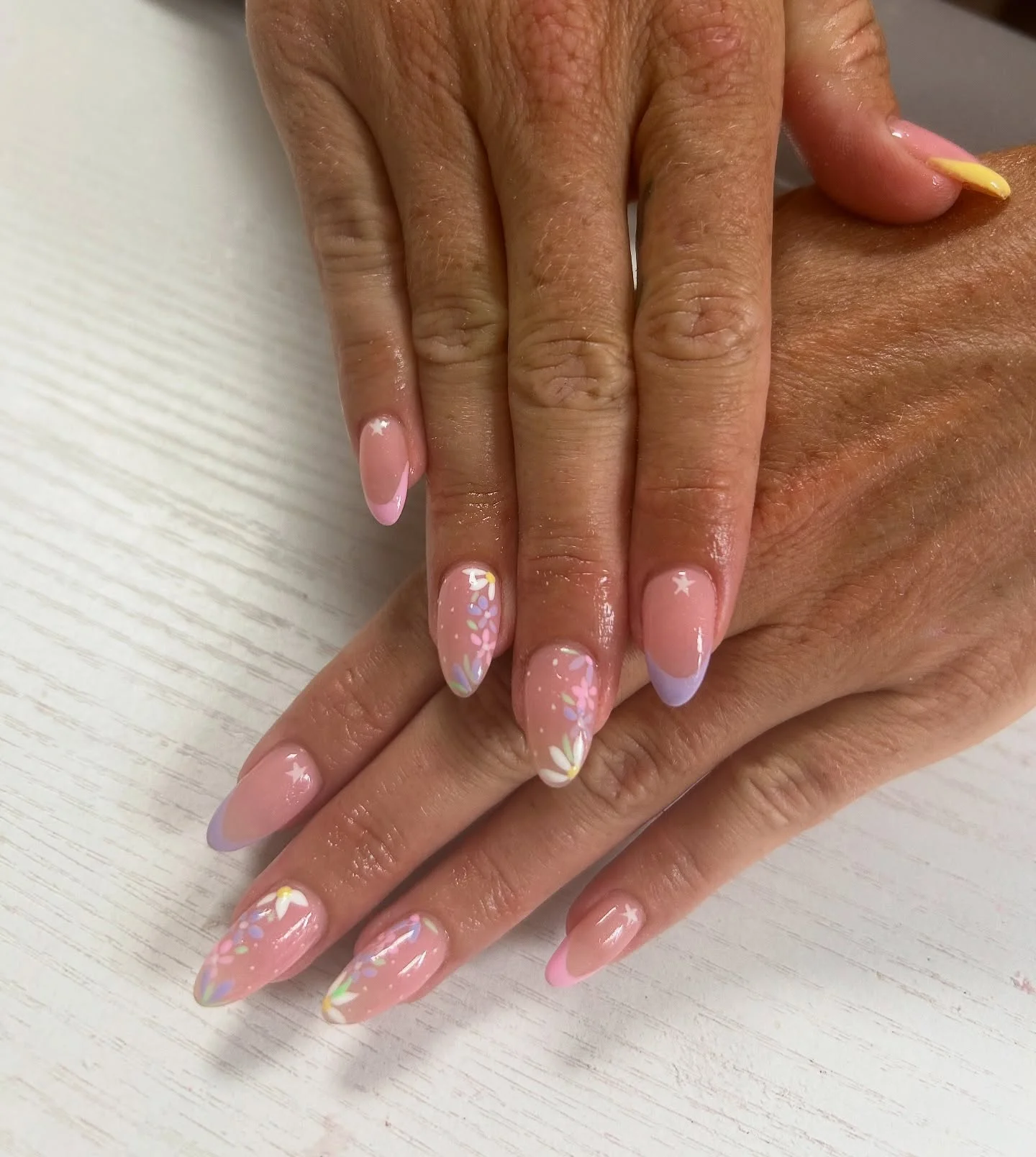 july nails design ideas 2026 Pastel Wildflower Almond Nails