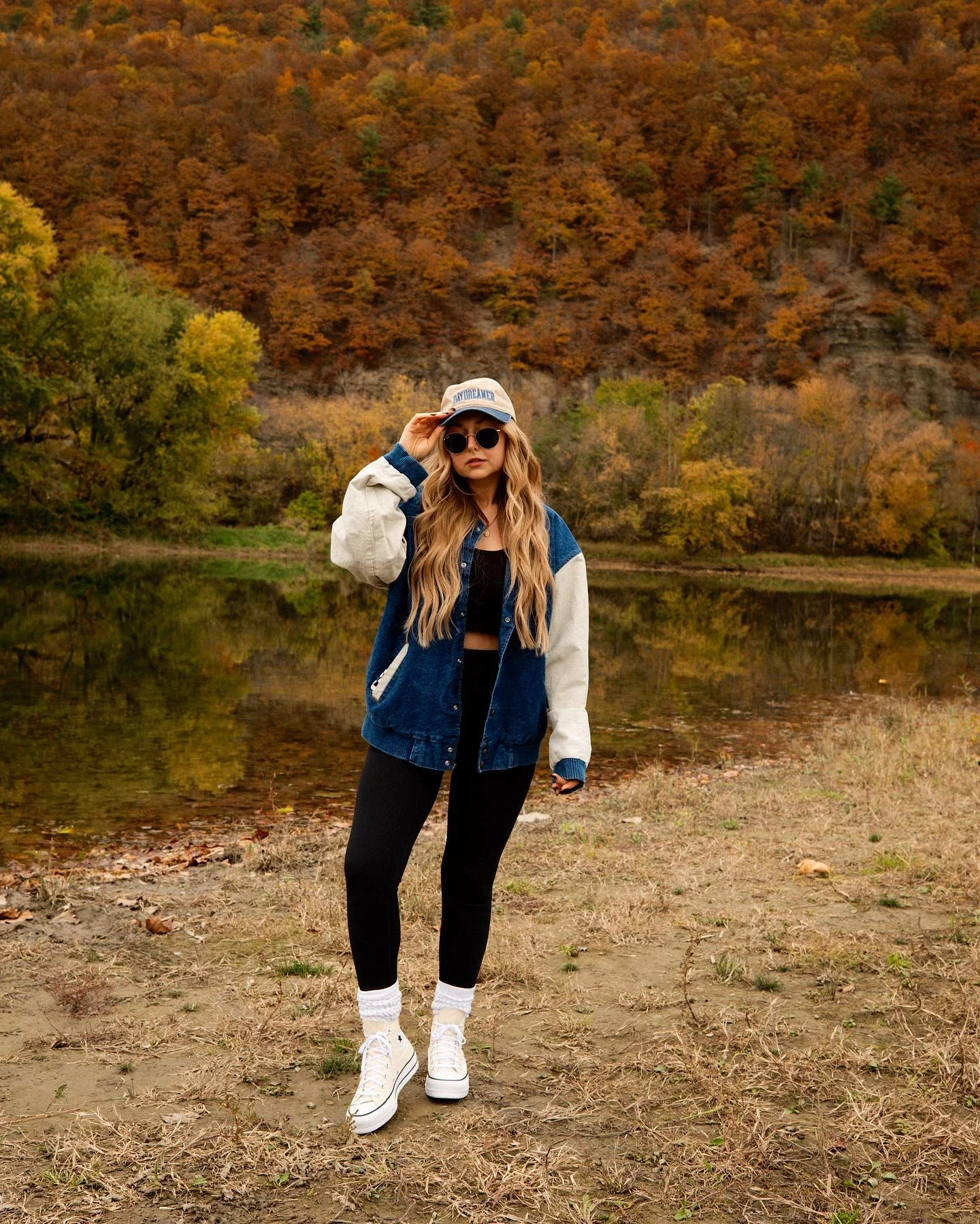fall outfits with leggings 2026 Varsity Jacket And Converse For A Relaxed Weekend Look
