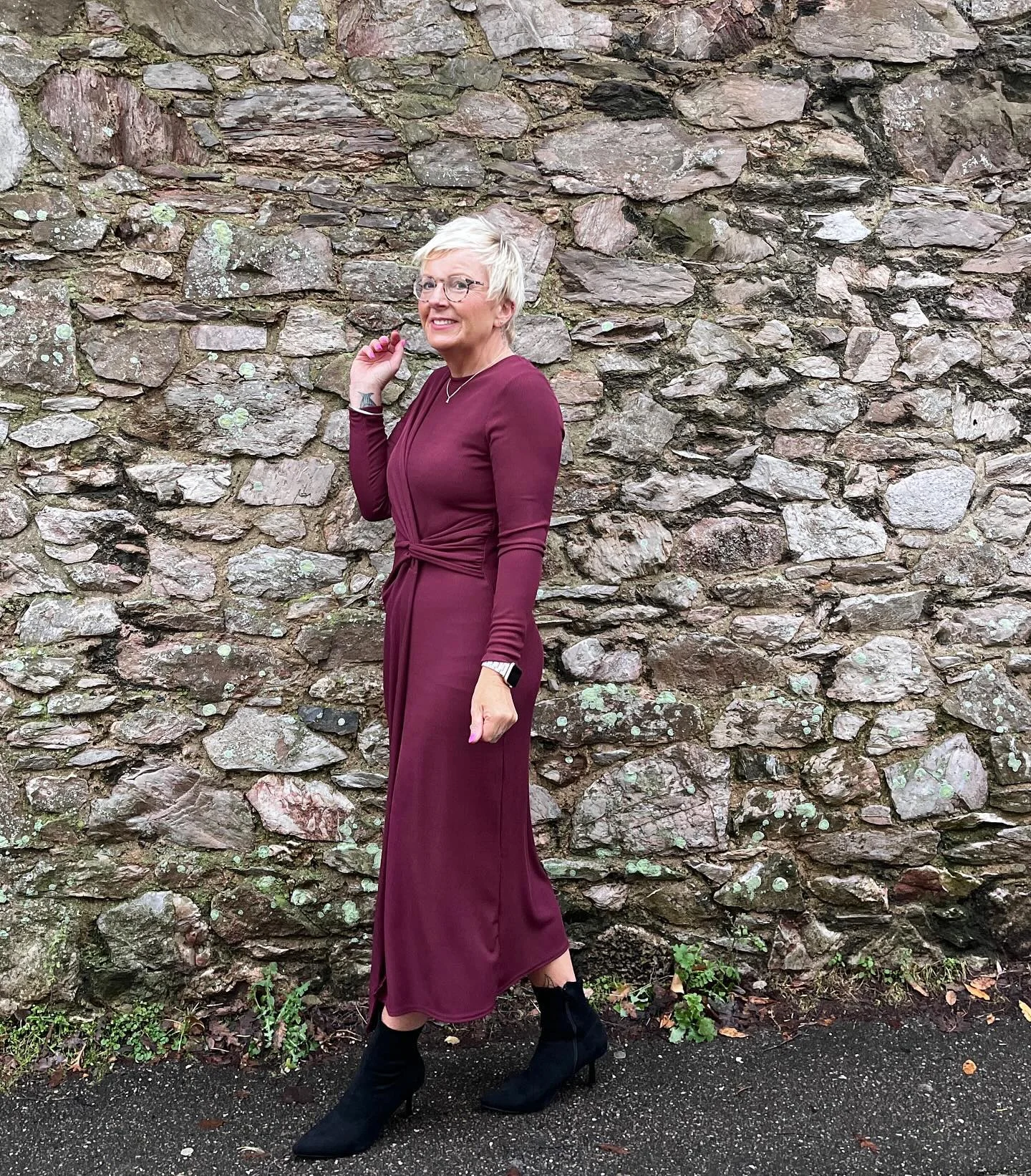 what to wear in fall 2026 over 50 Burgundy Knit Dress And Ankle Boots For Effortless Elegance