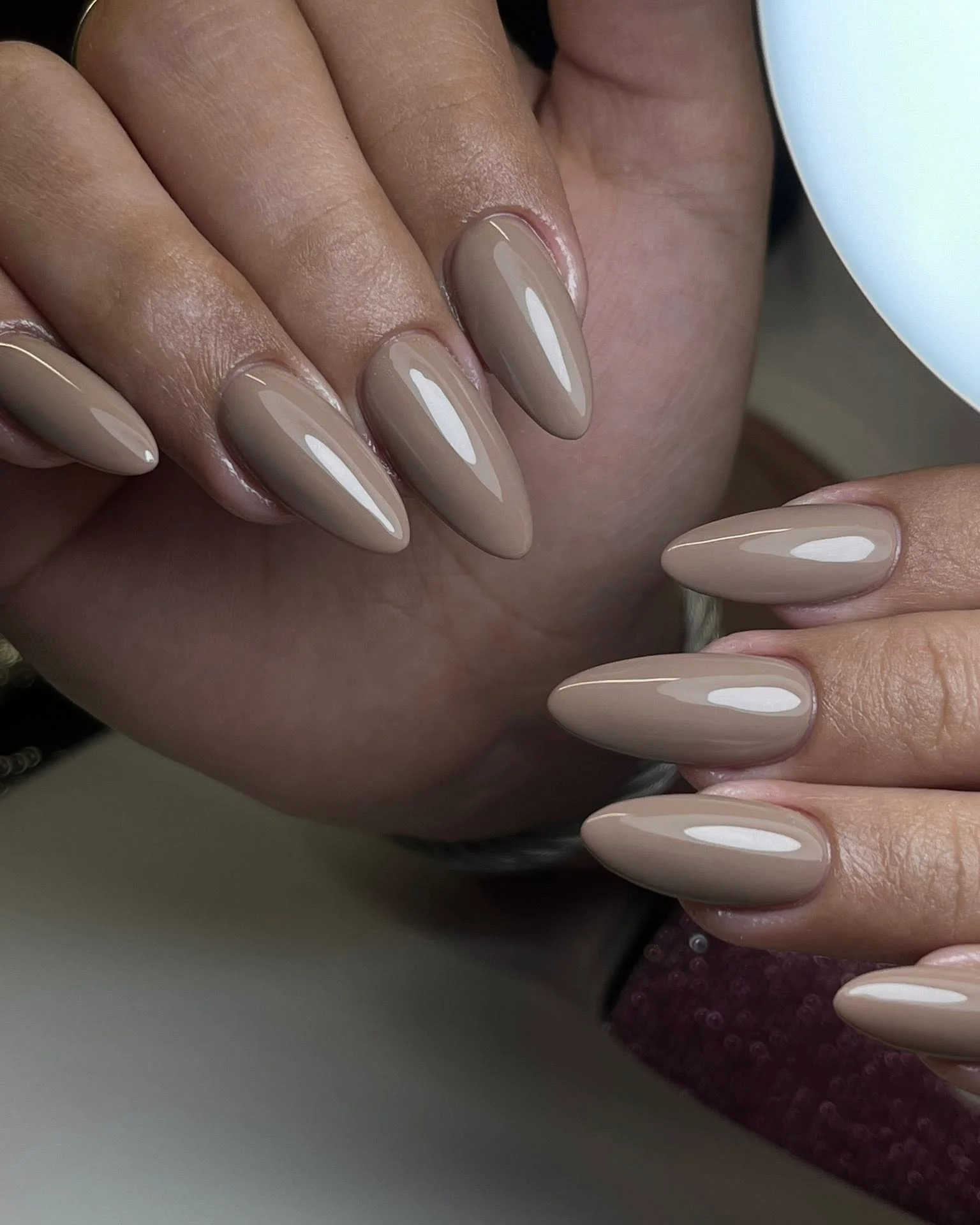 plain summer nails 2026 Glossy Taupe Almond Nails For Modern Minimalists