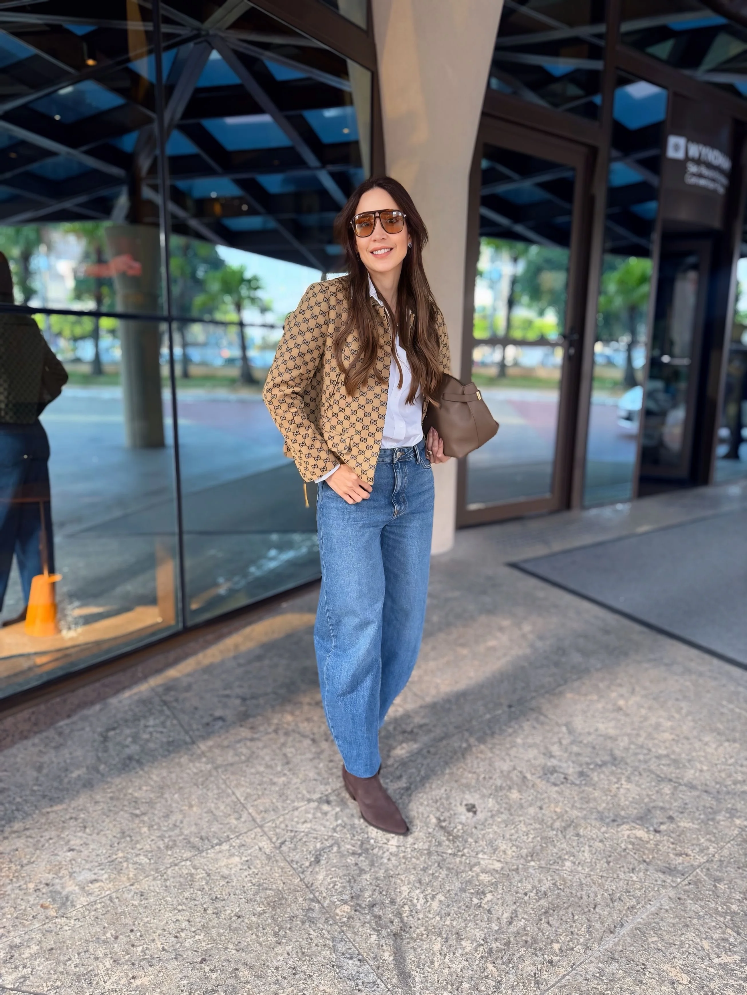 fall outfits with jeans 2026 The Modern Logo Jacket And Relaxed Jeans Formula