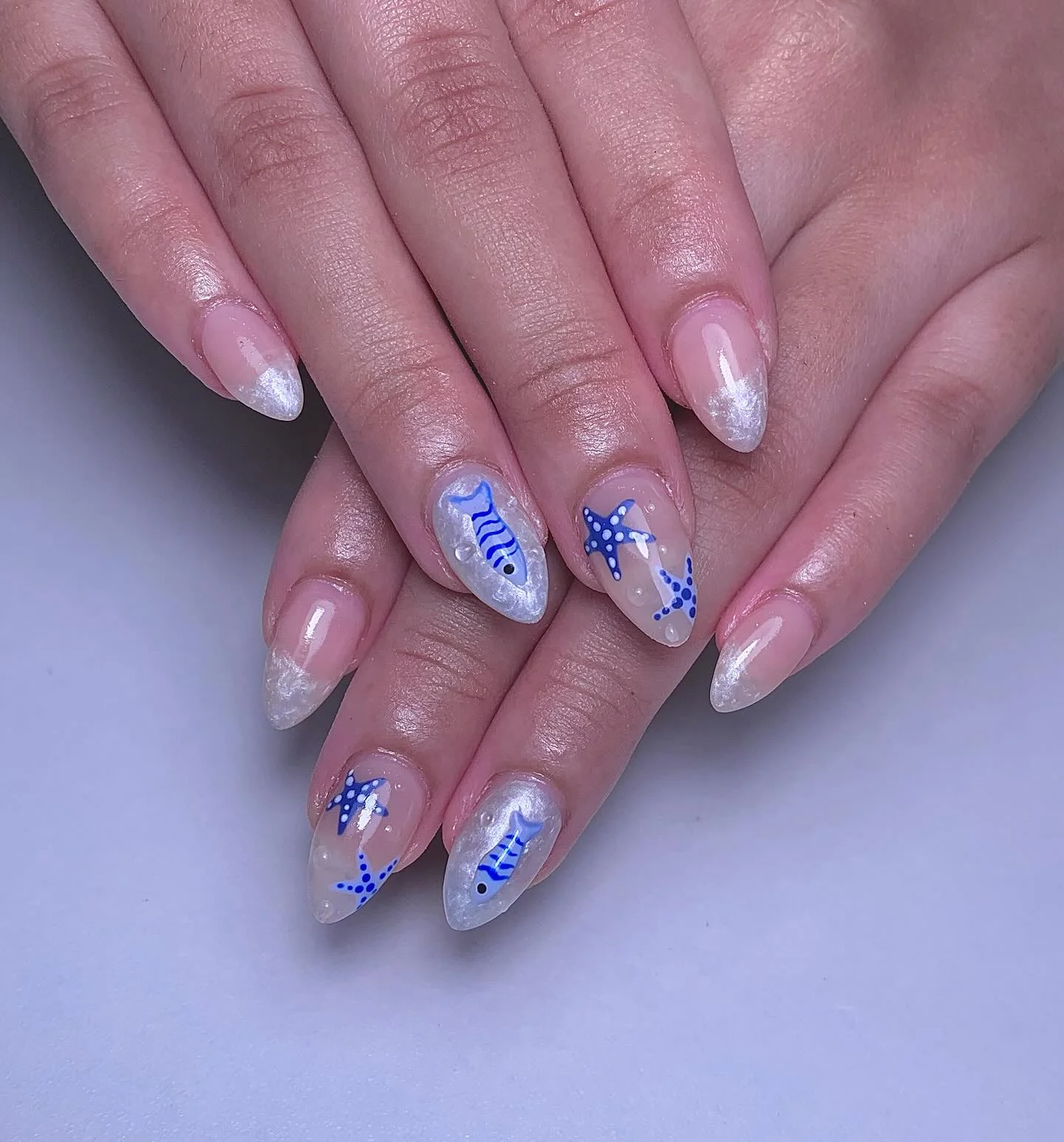 july nails design ideas 2026 Coastal Pearl Sea Life Nails