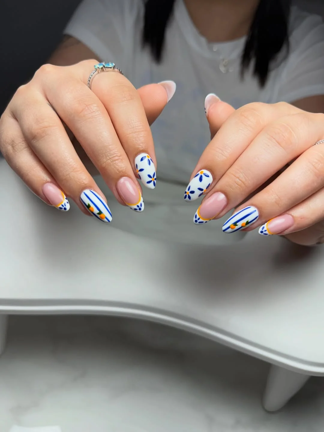 summer oval nails 2026 Mediterranean Blue Floral Elegance